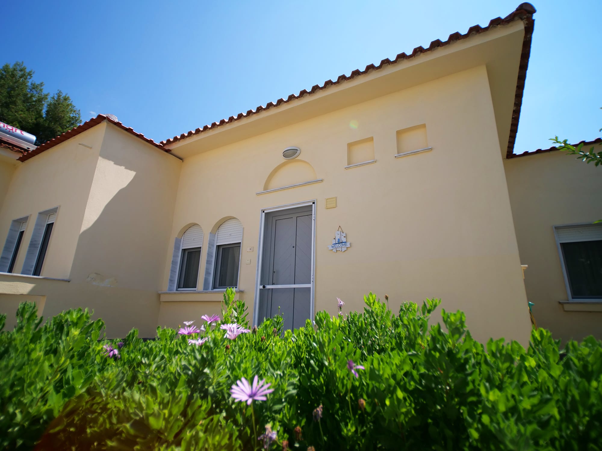 a house with a flower garden