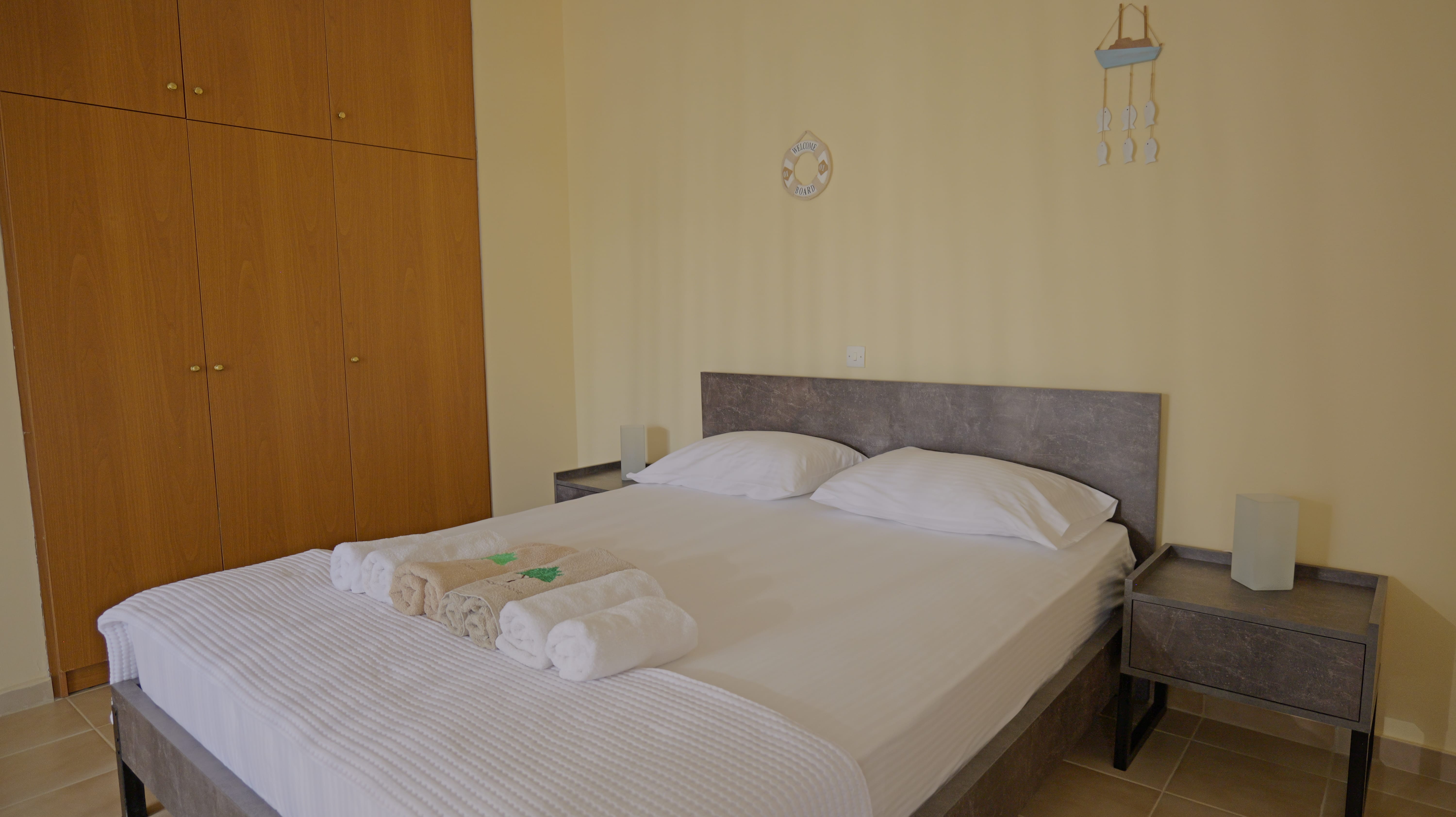 a bed with white sheets