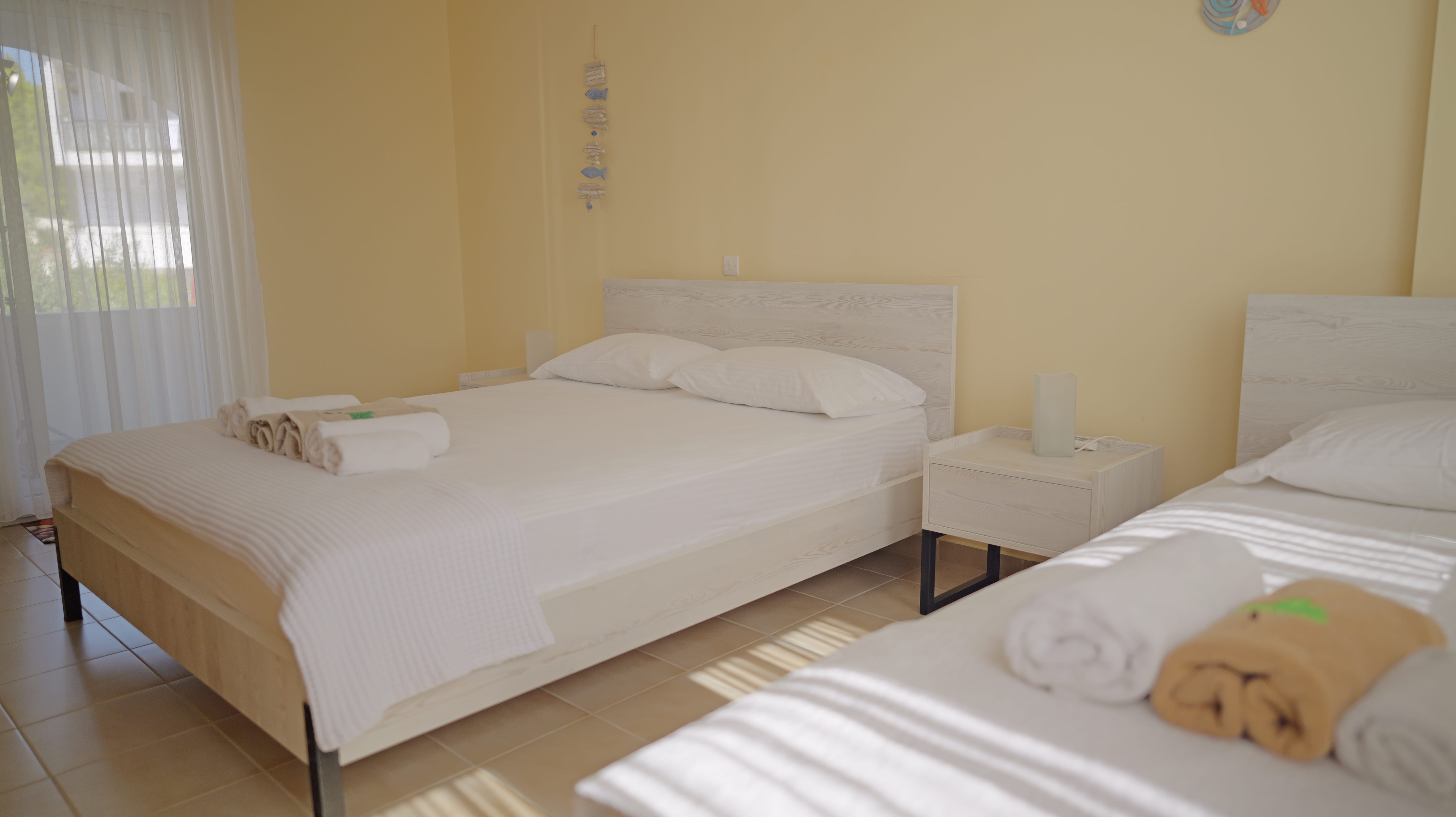 a bedroom with two beds