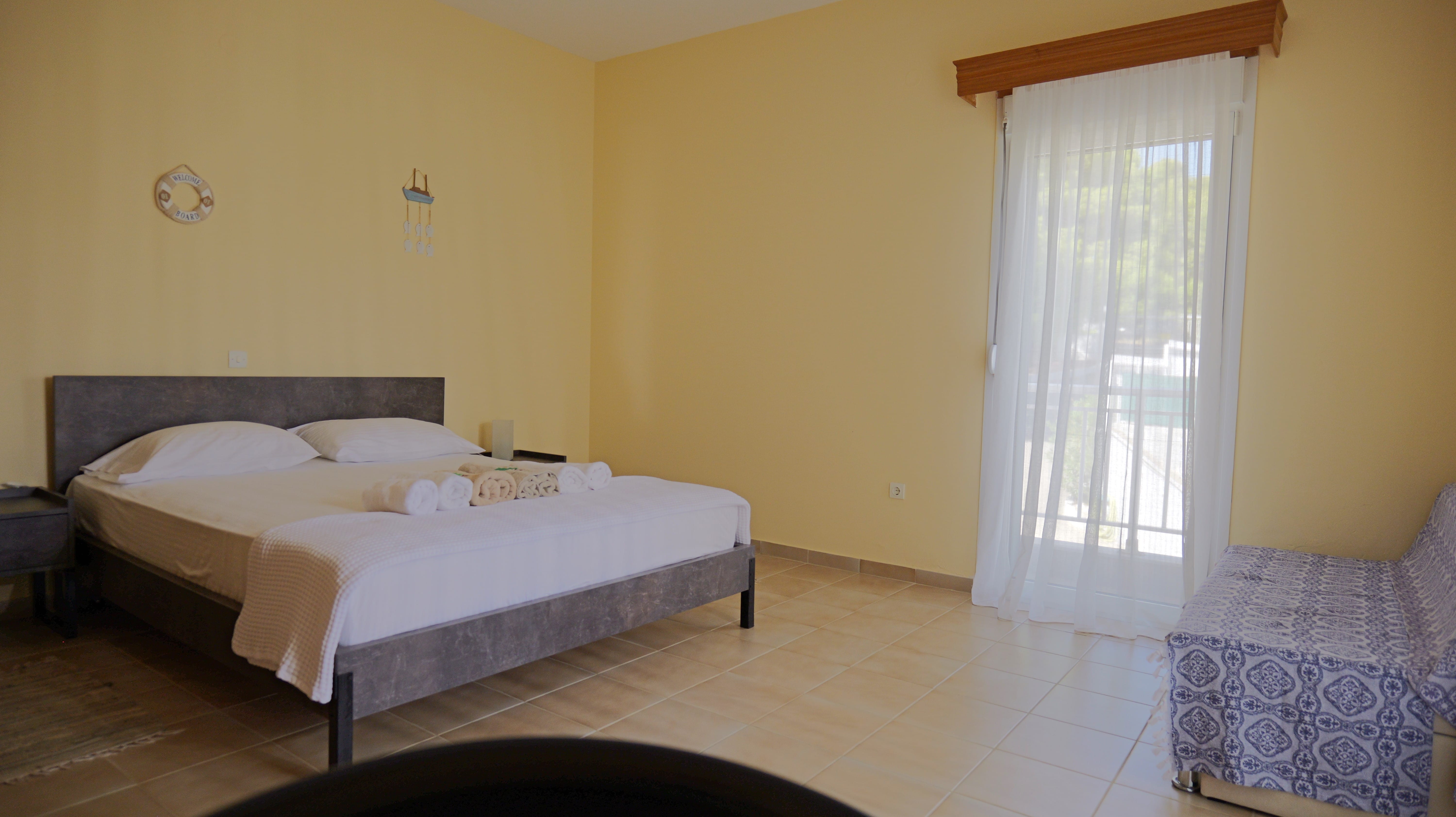 a bedroom with a bed and a door