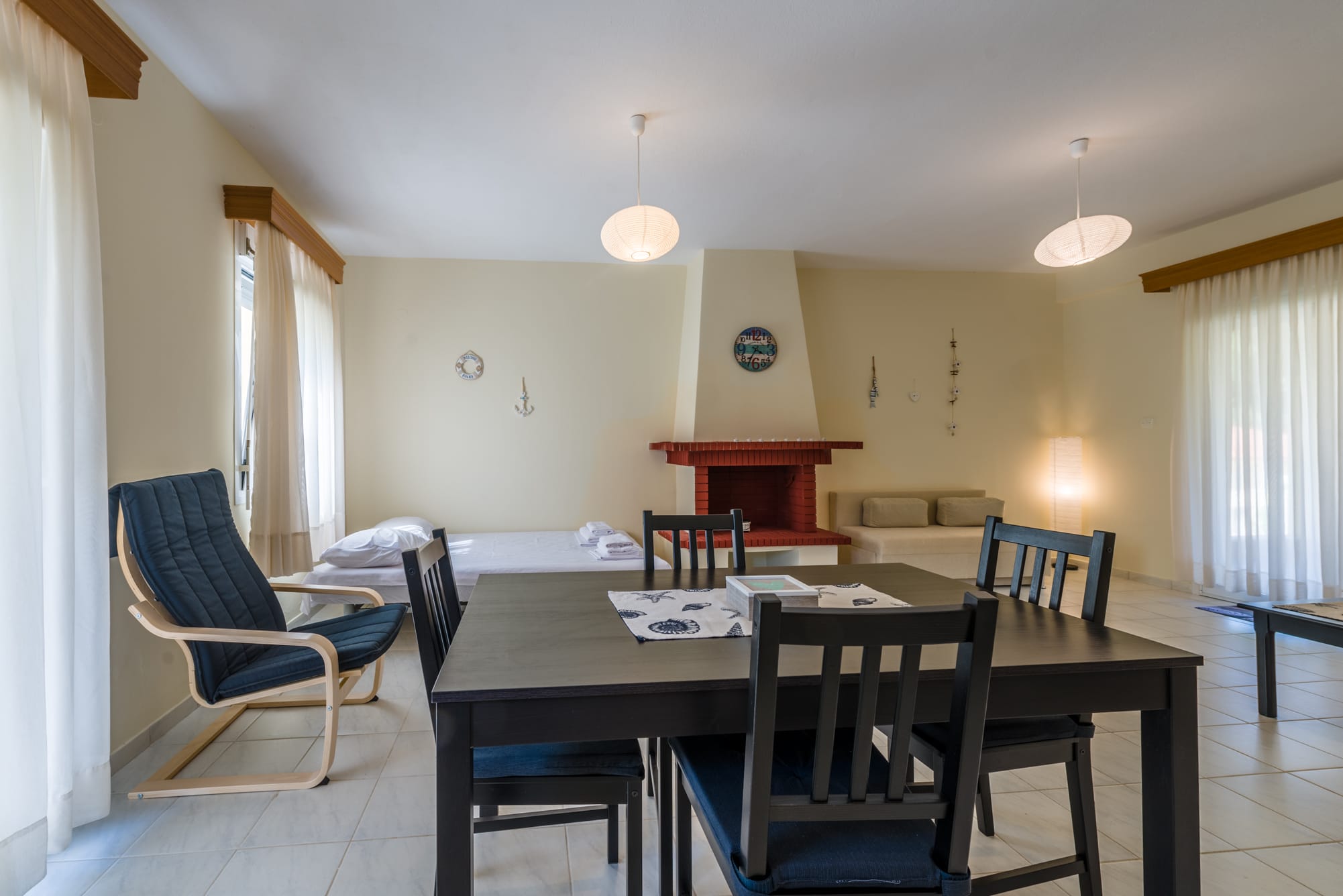 a room with a table and chairs
