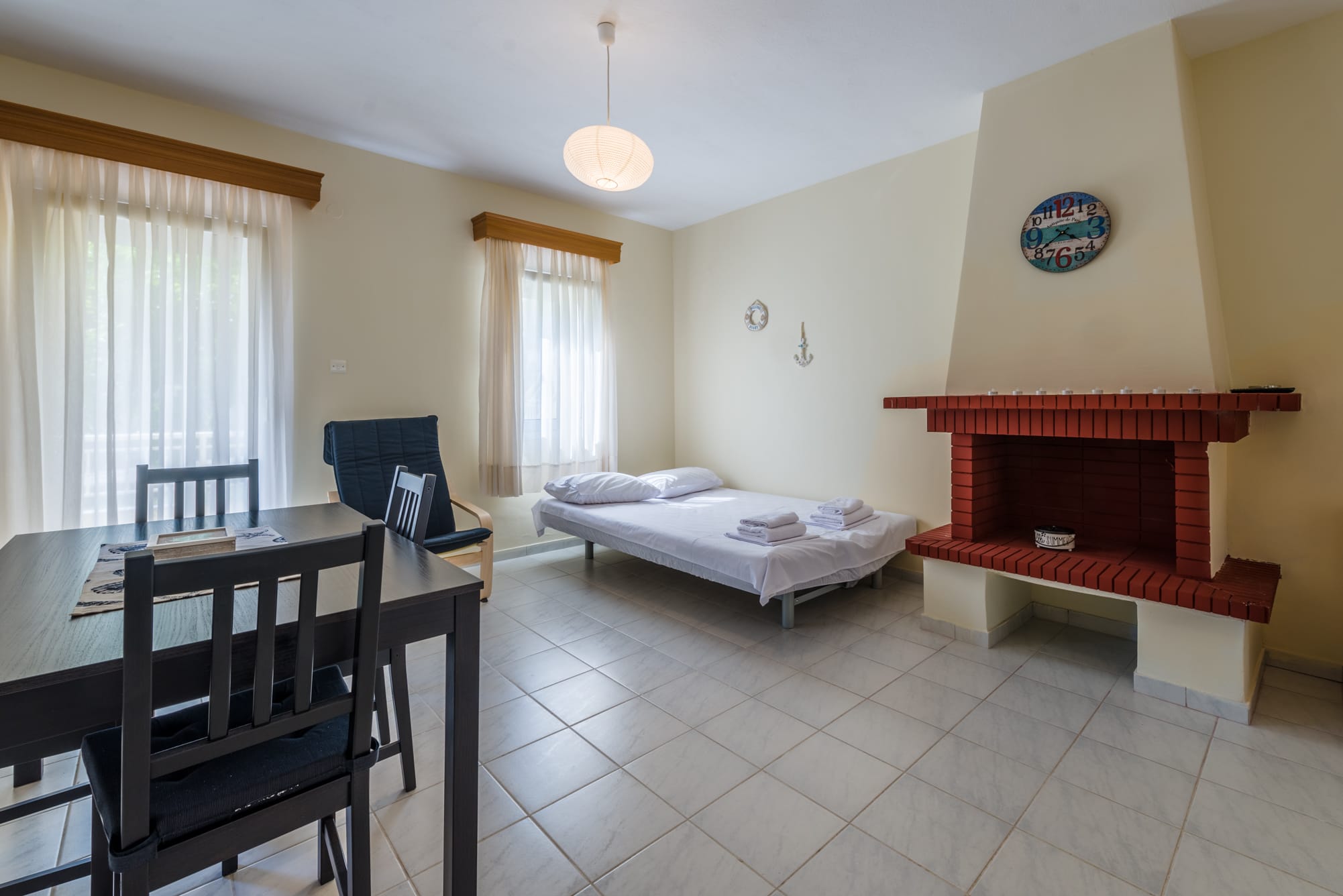 a room with a bed and a table