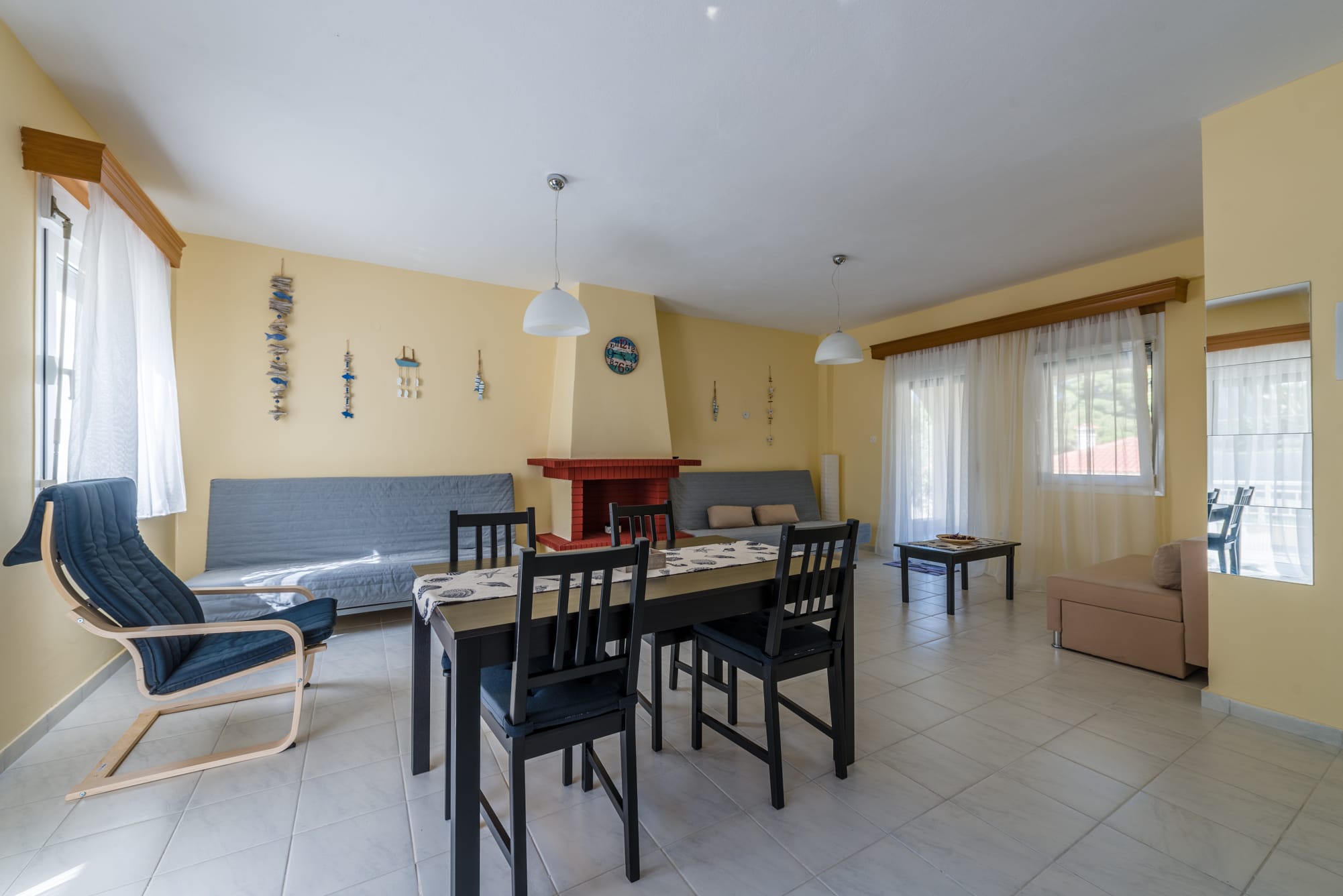 a room with a table and chairs