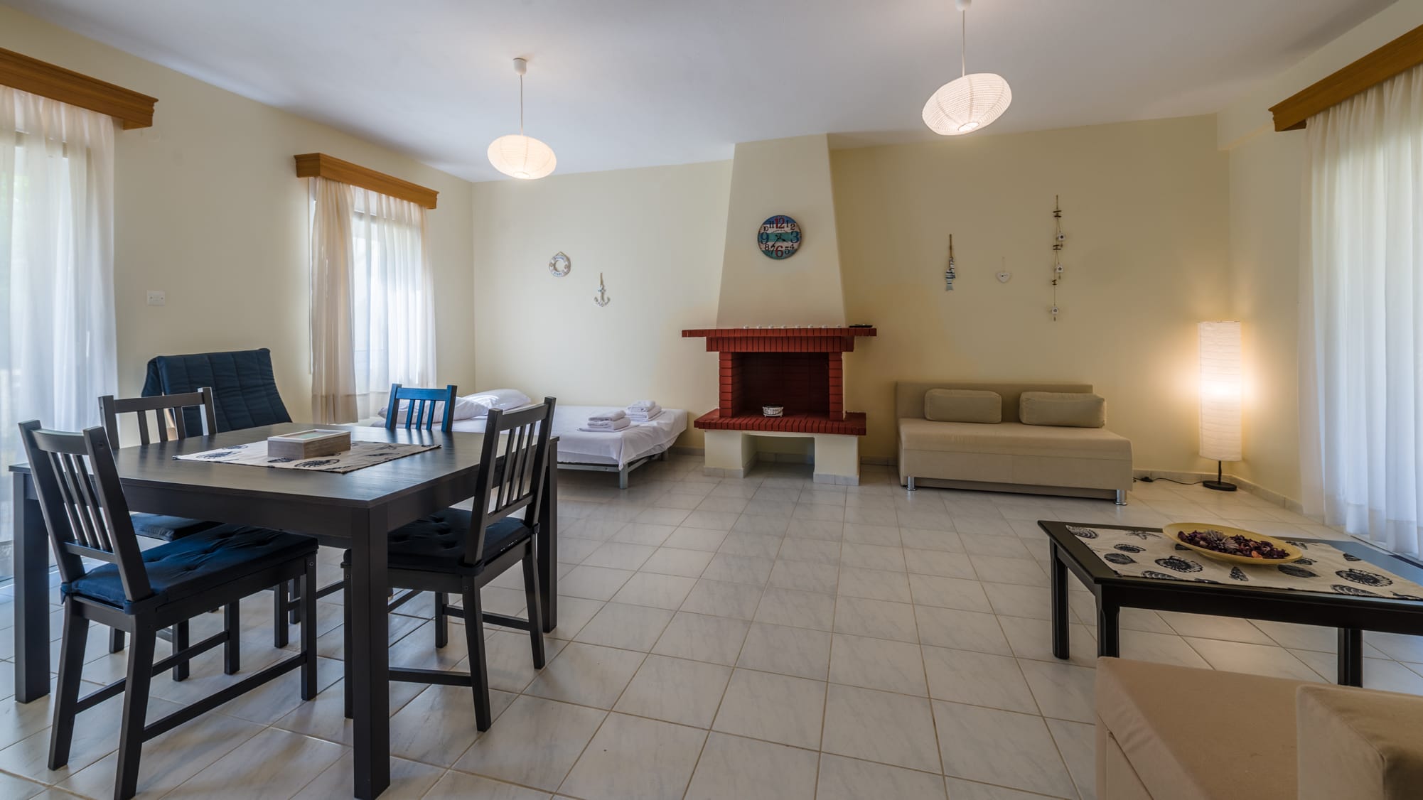 a room with a table and chairs