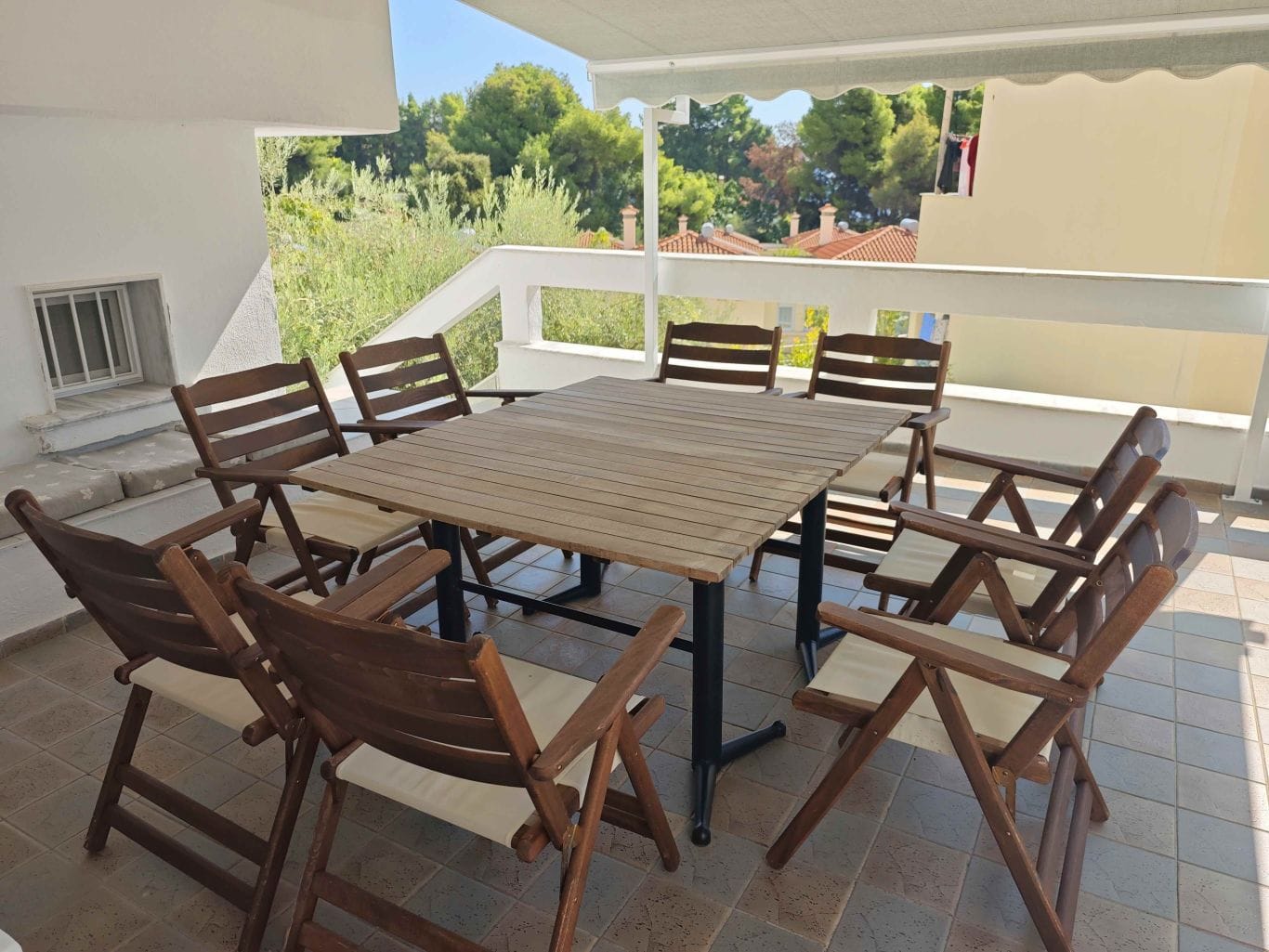 a table and chairs on a patio