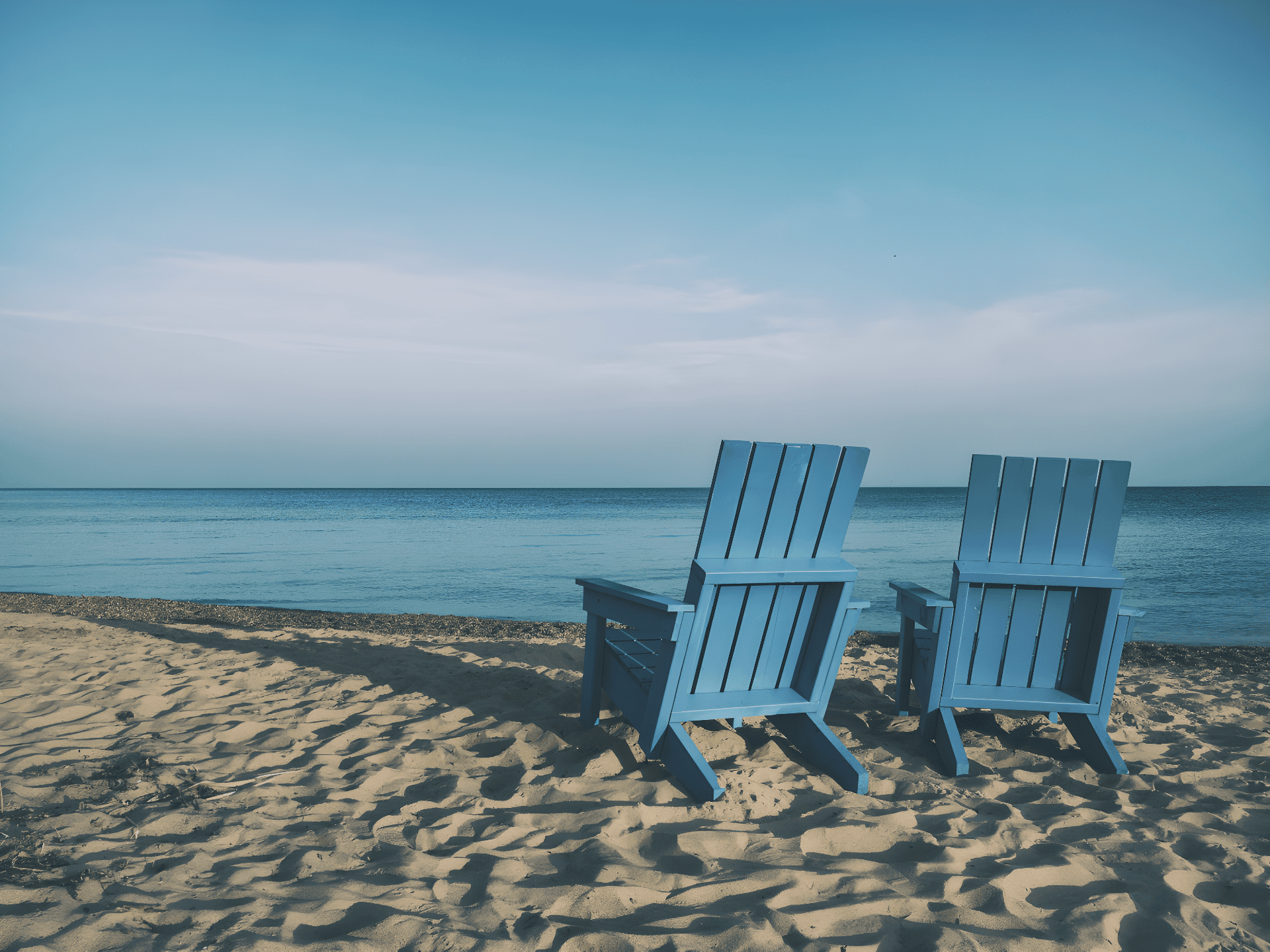 two chairs on a beach