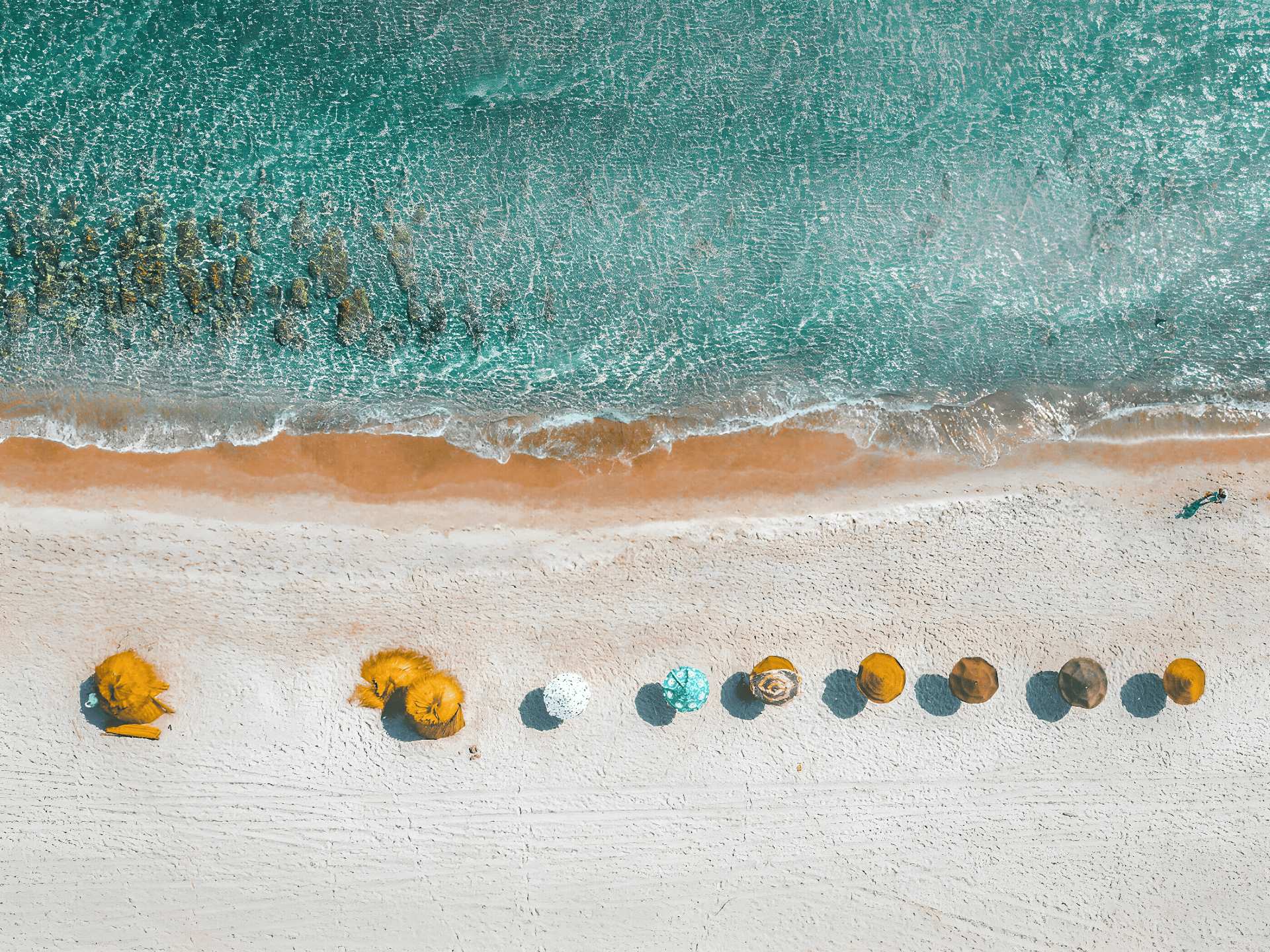 a group of colorful balls on a white surface