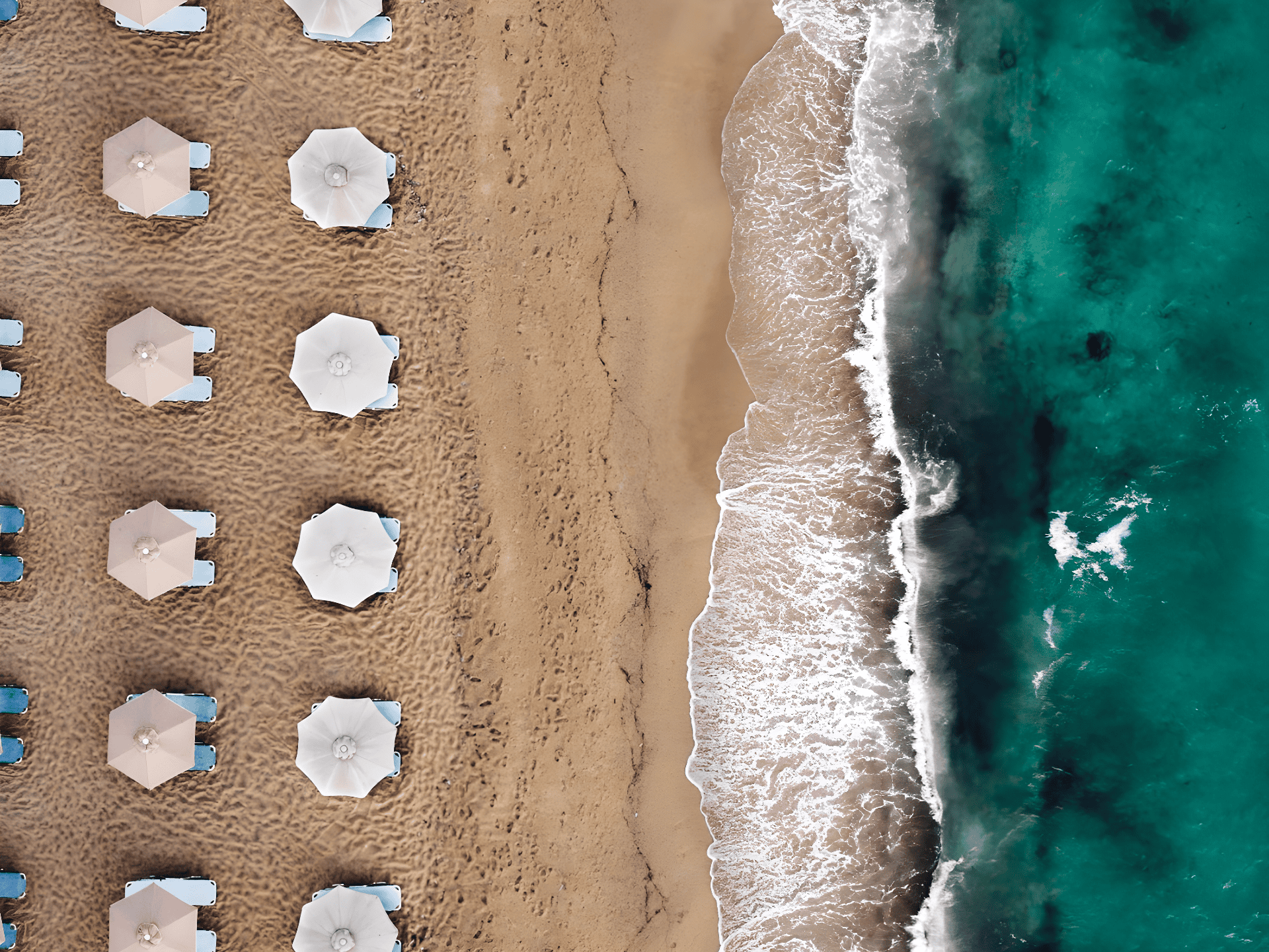 a beach with sand and water