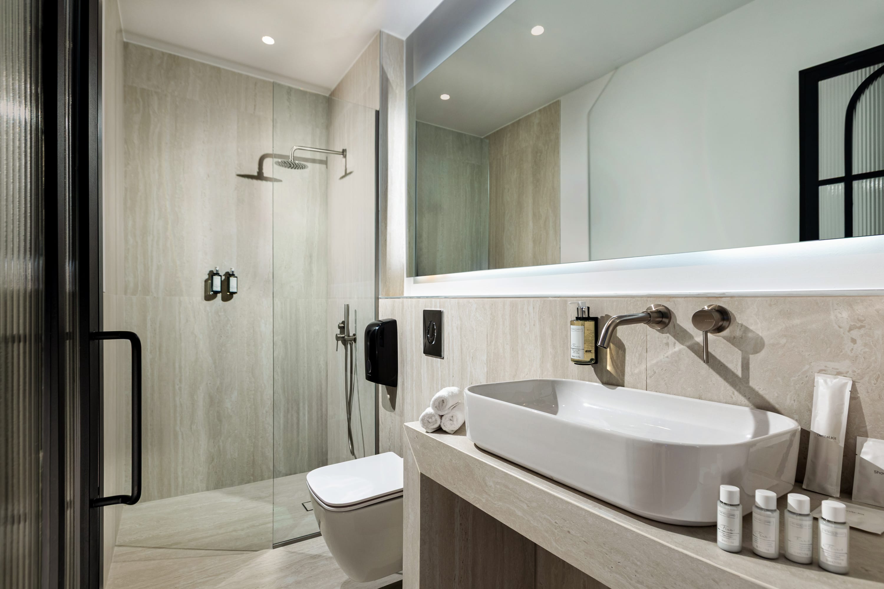 a bathroom with a sink and a toilet