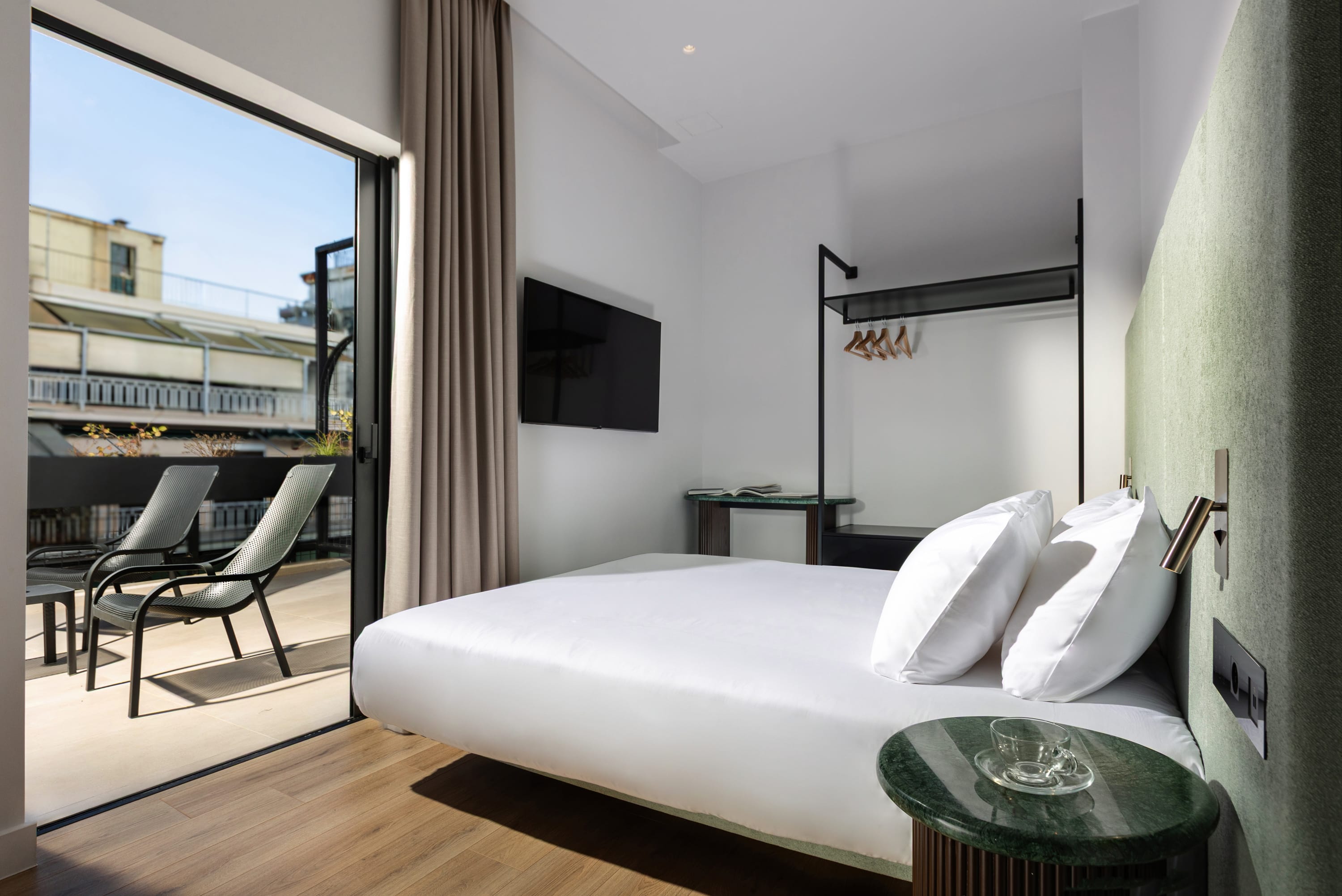 a bedroom with a large window