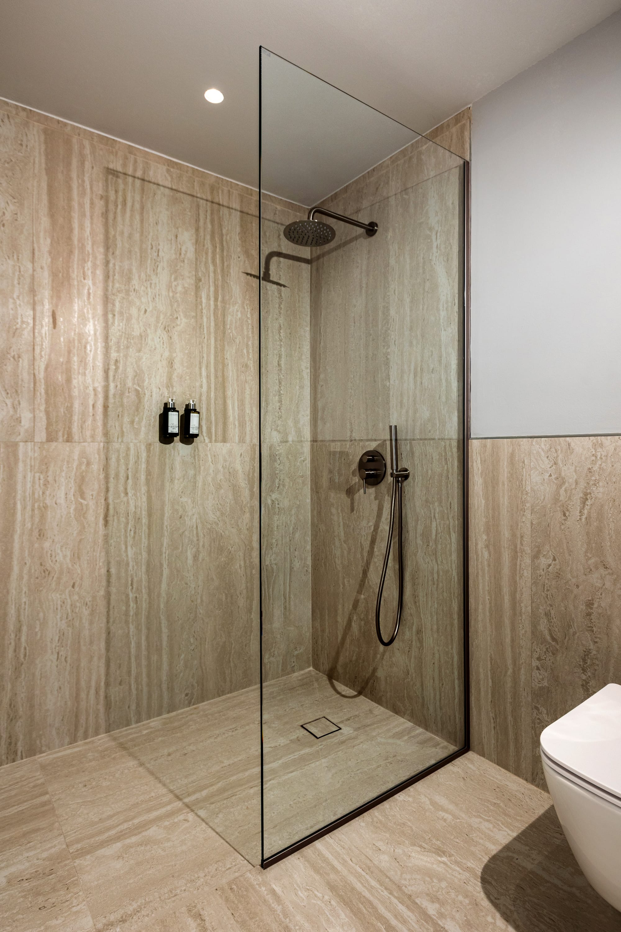 a shower with a glass door