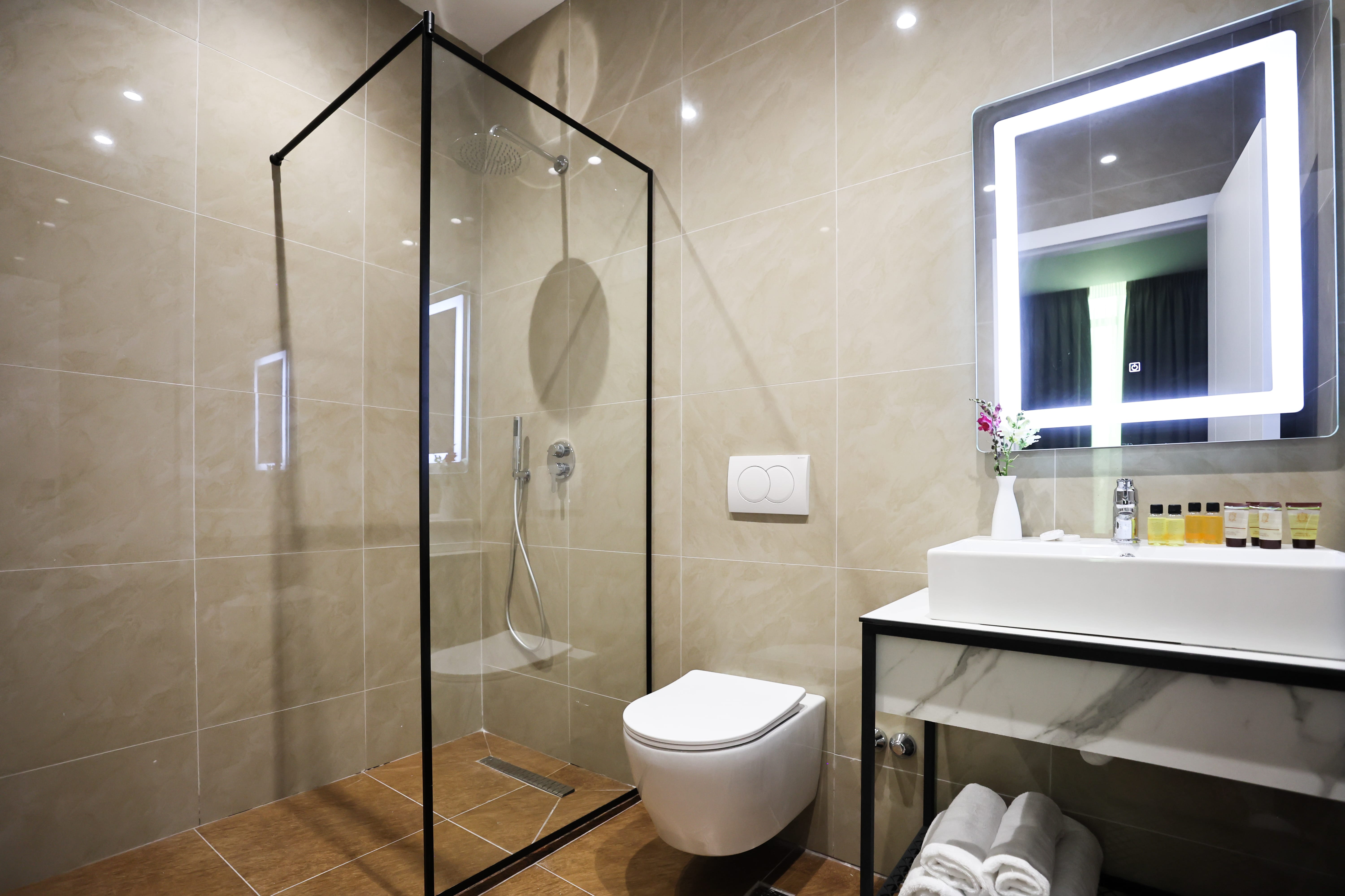 a bathroom with a glass shower