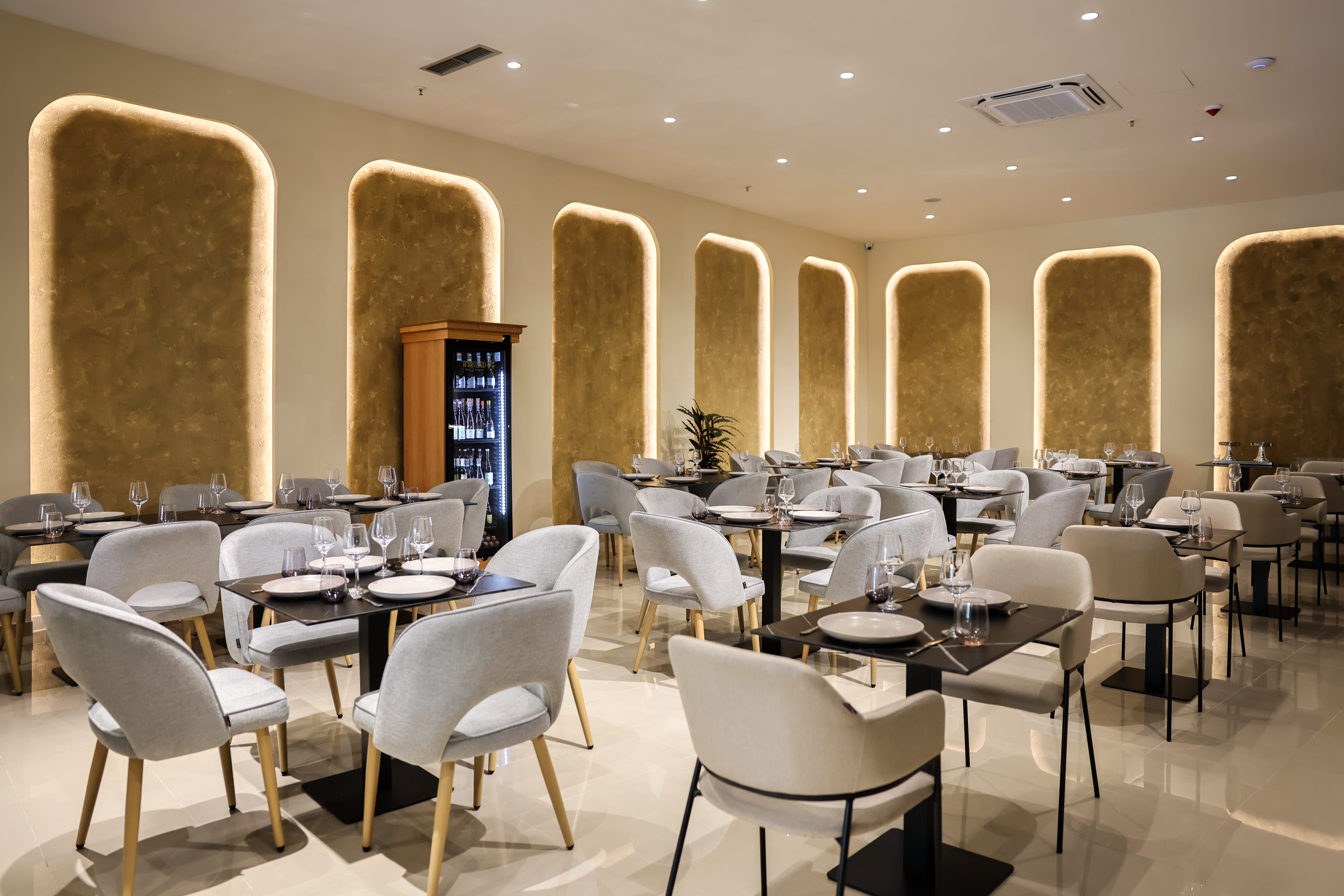 a room with tables and chairs