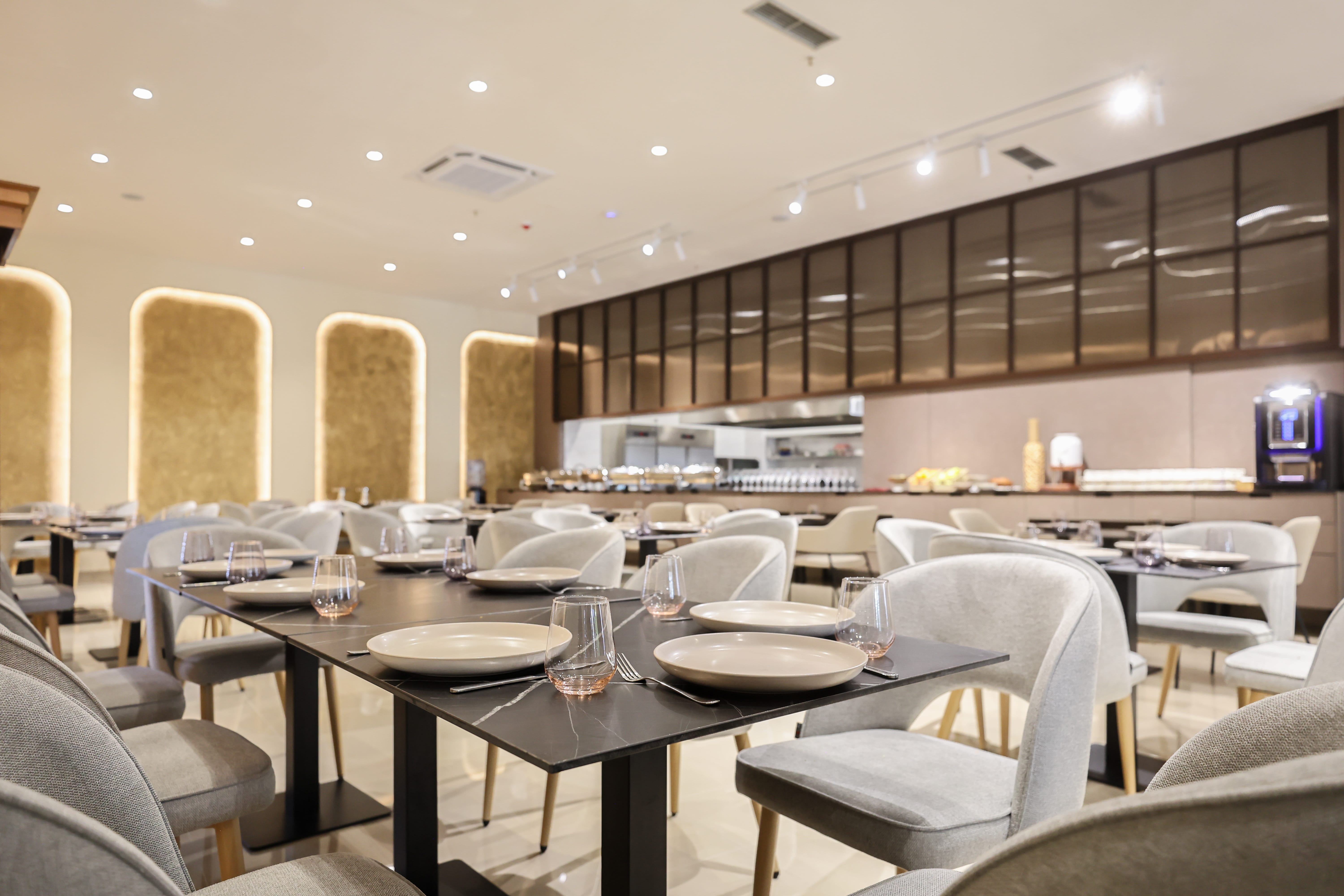 a restaurant with tables and chairs