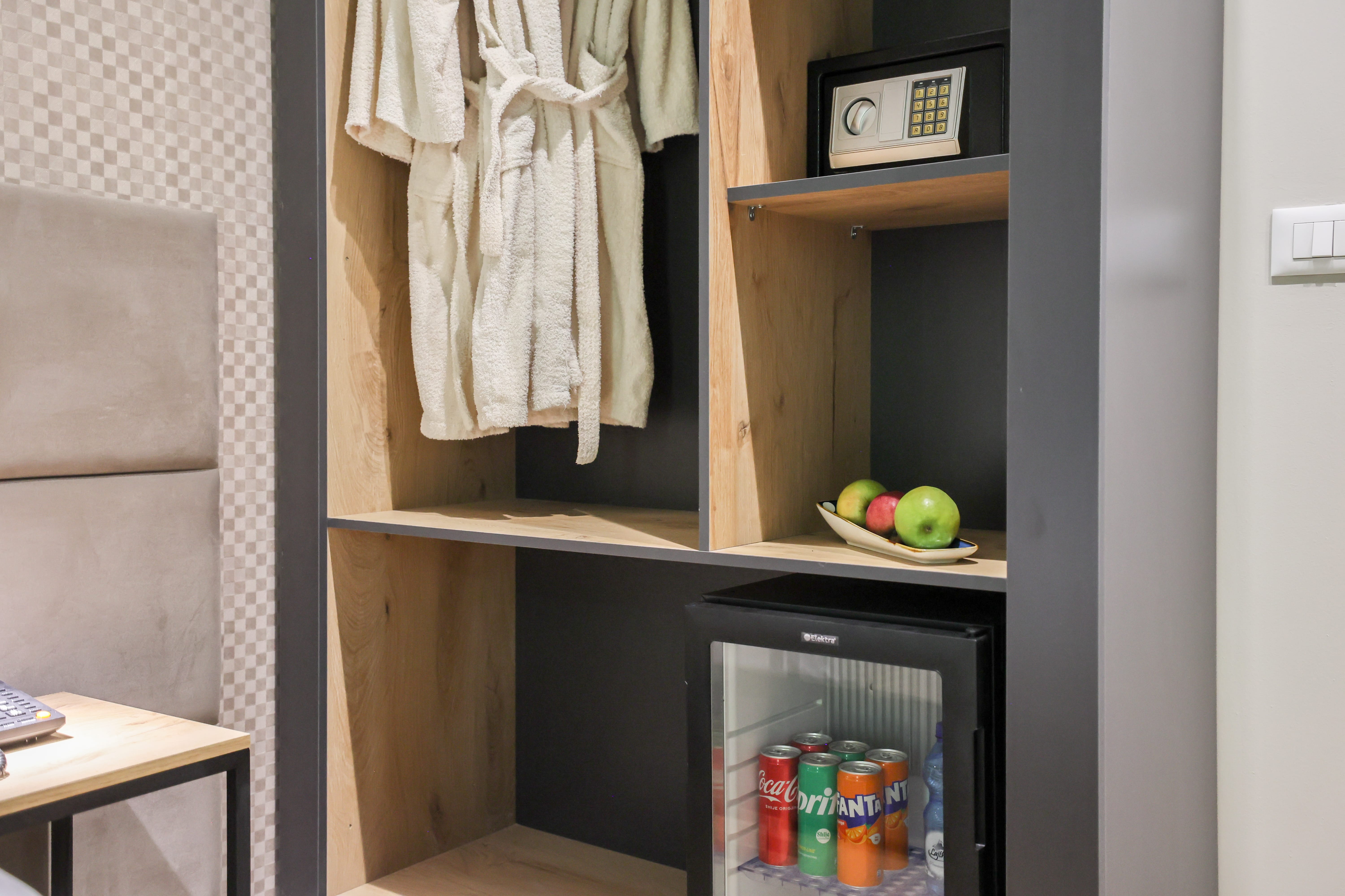 a shelf with clothes on it