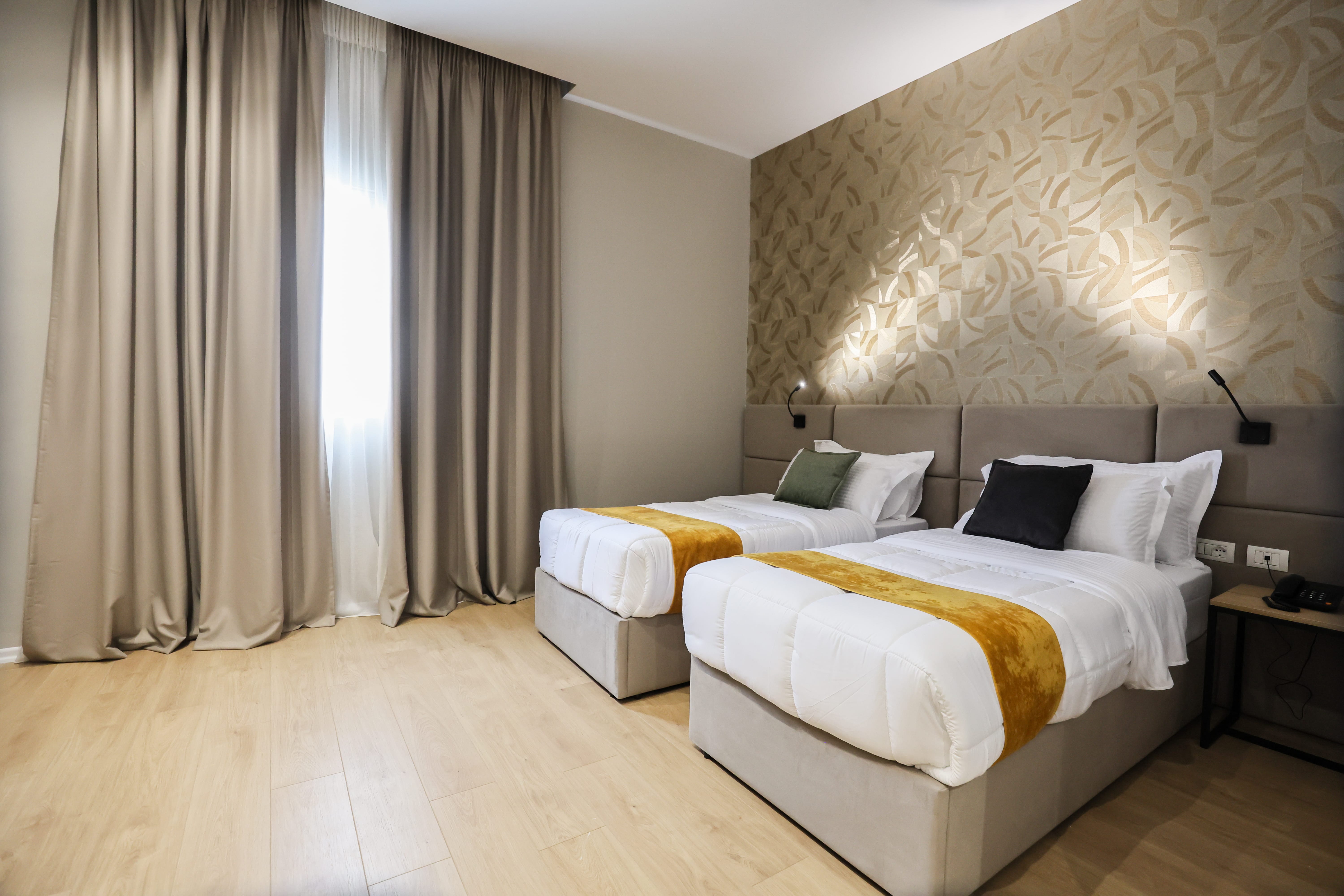 a bedroom with a bed and a couch