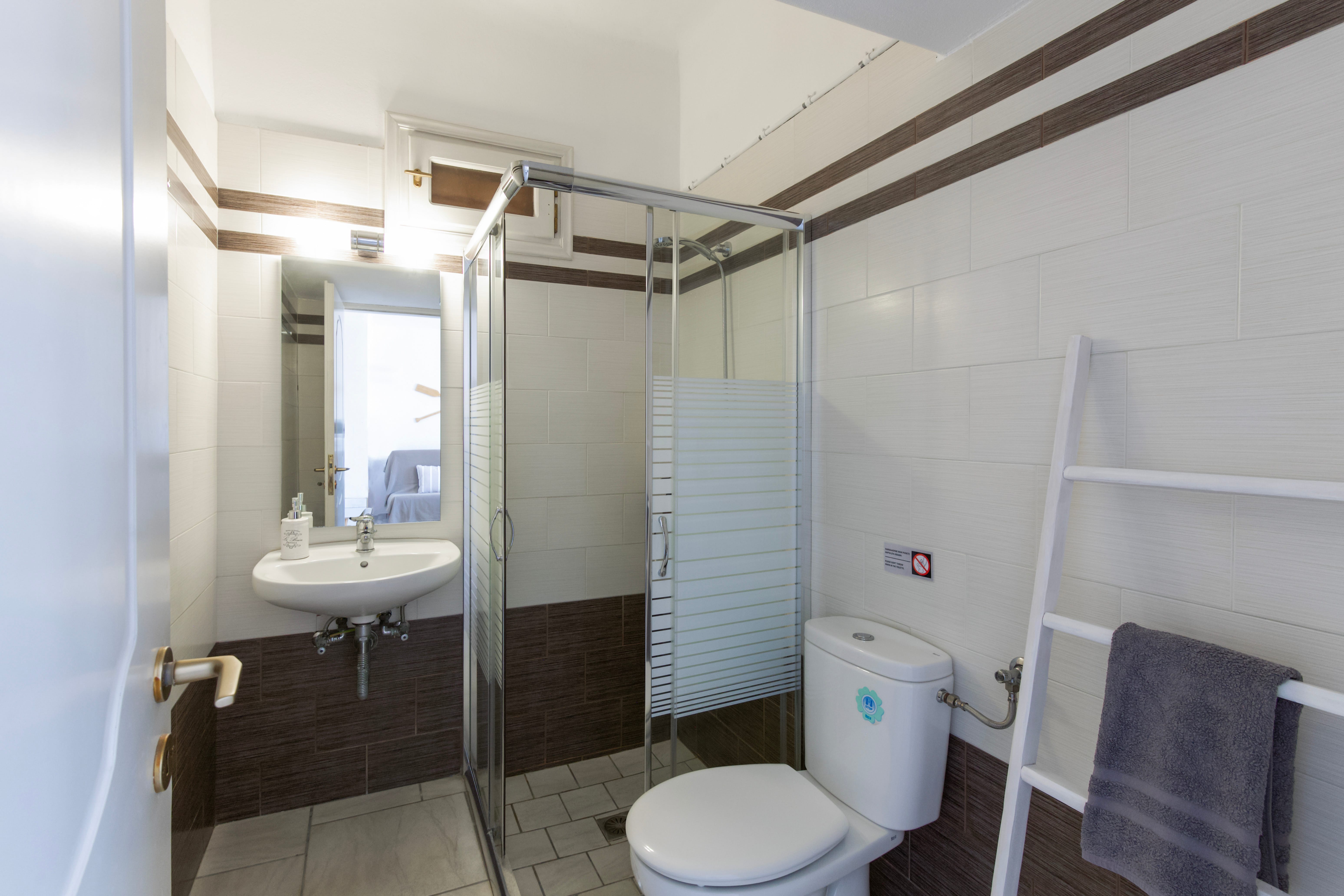 a bathroom with a glass shower