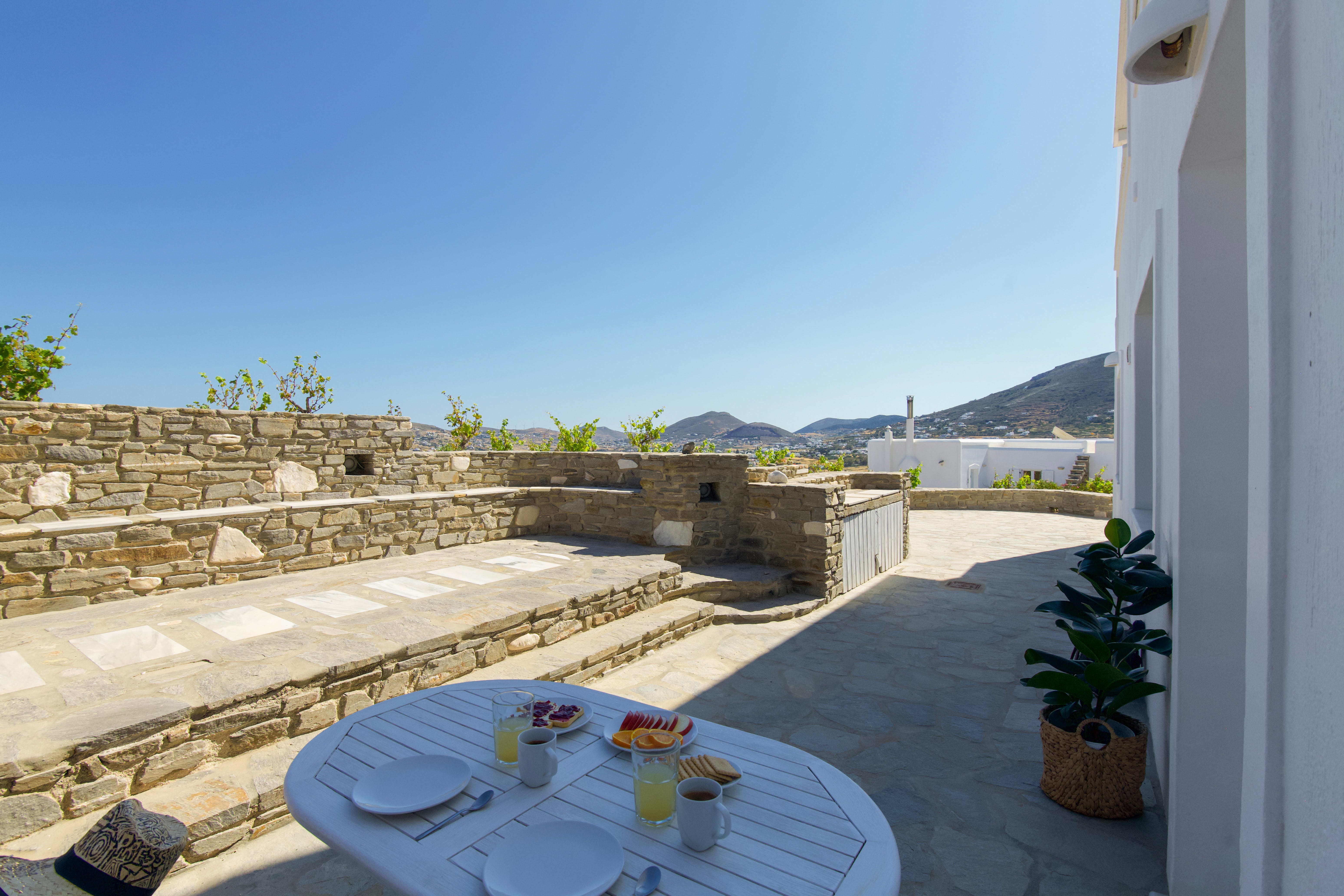a table and chairs on a patio