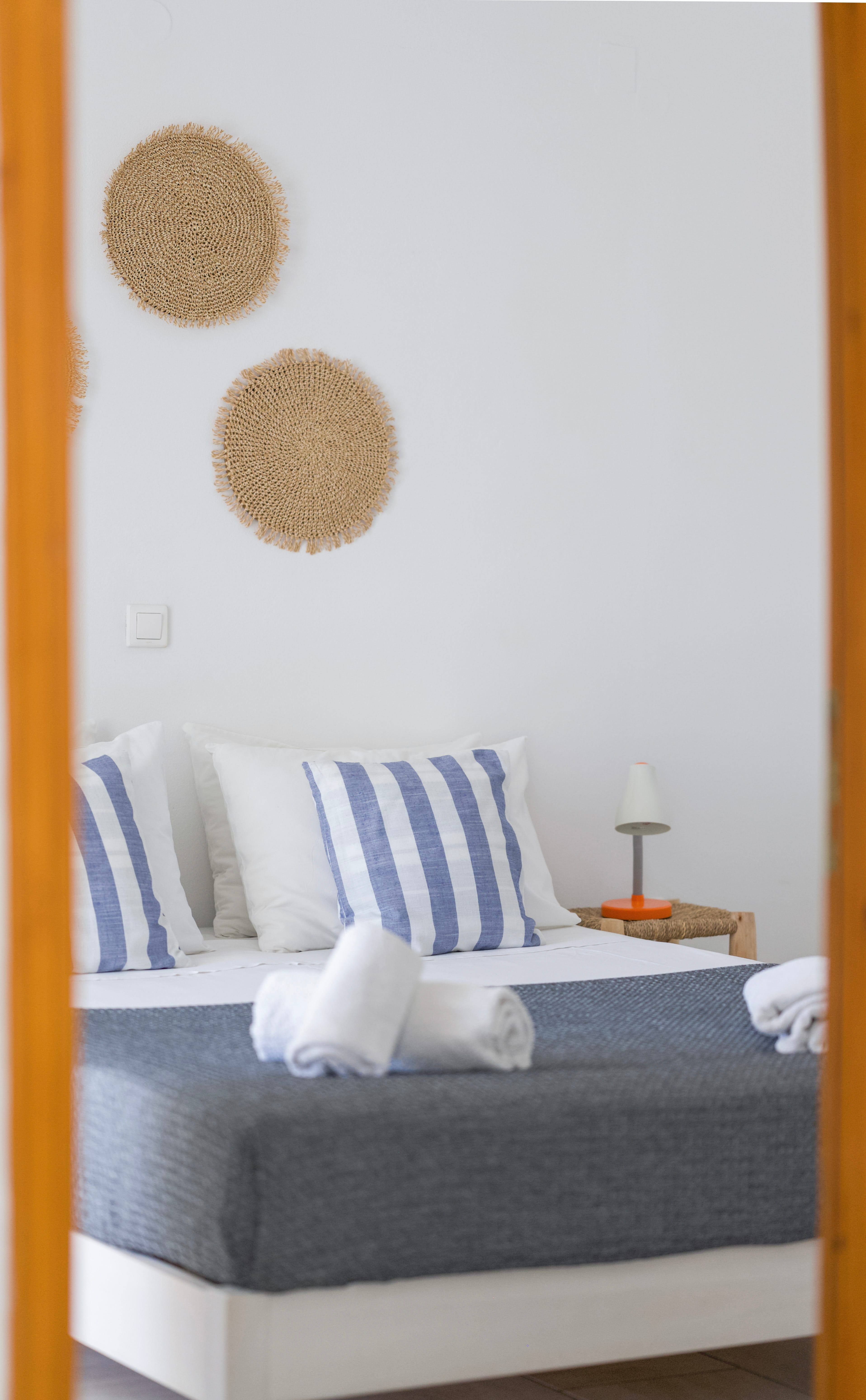 a bed with white pillows