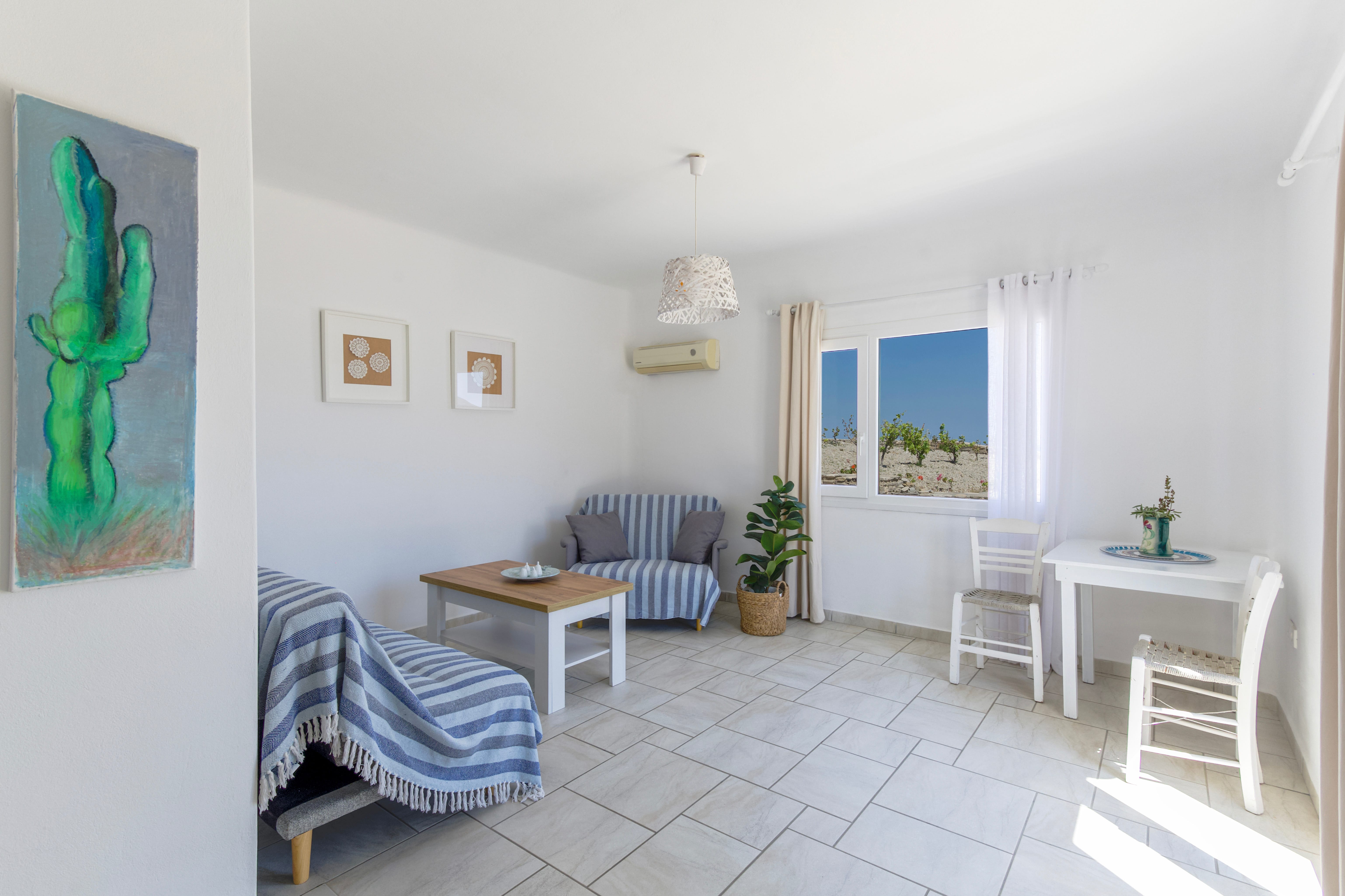 a room with a table and chairs