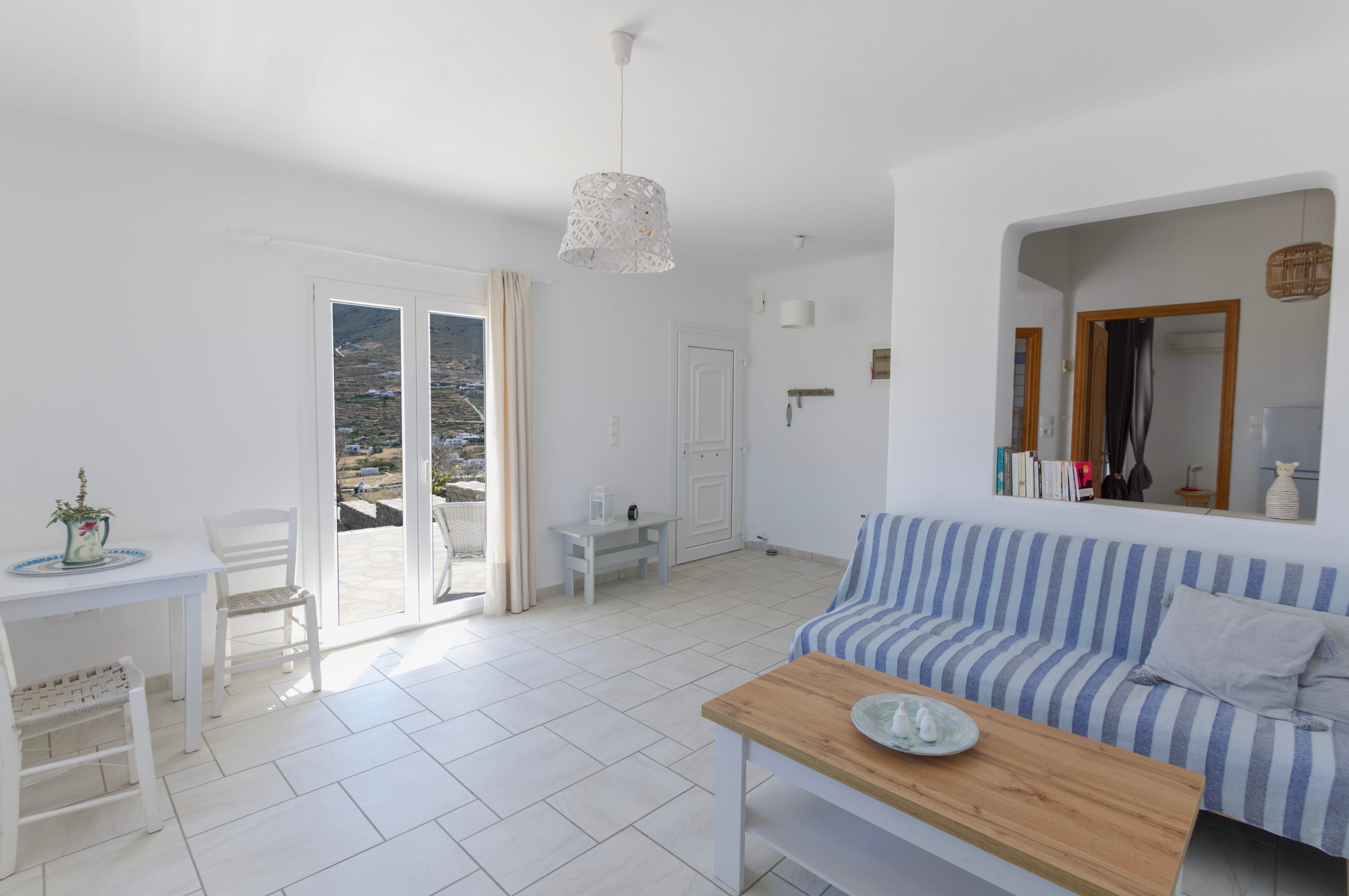 a room with a table and chairs