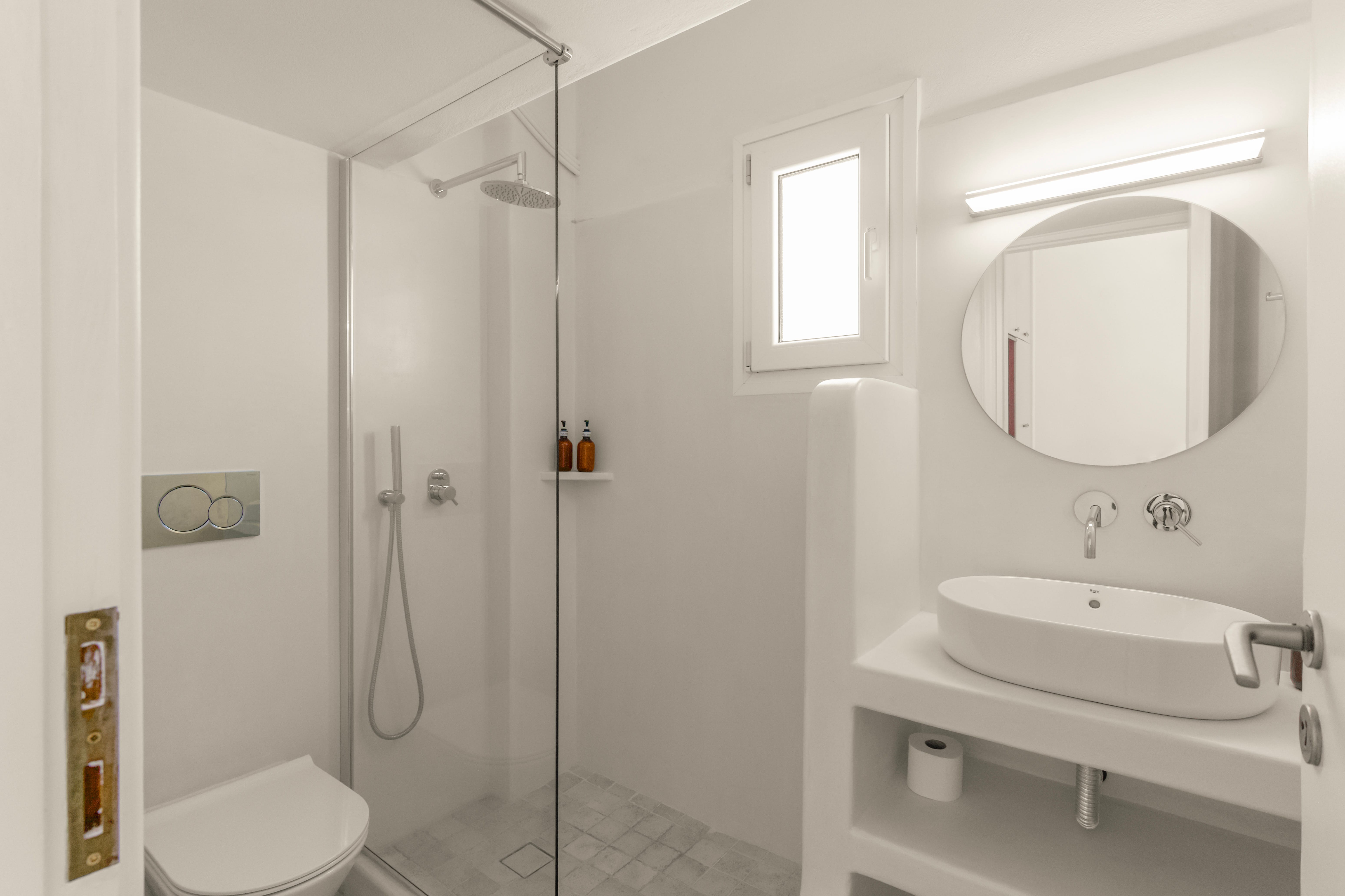 a bathroom with a glass shower