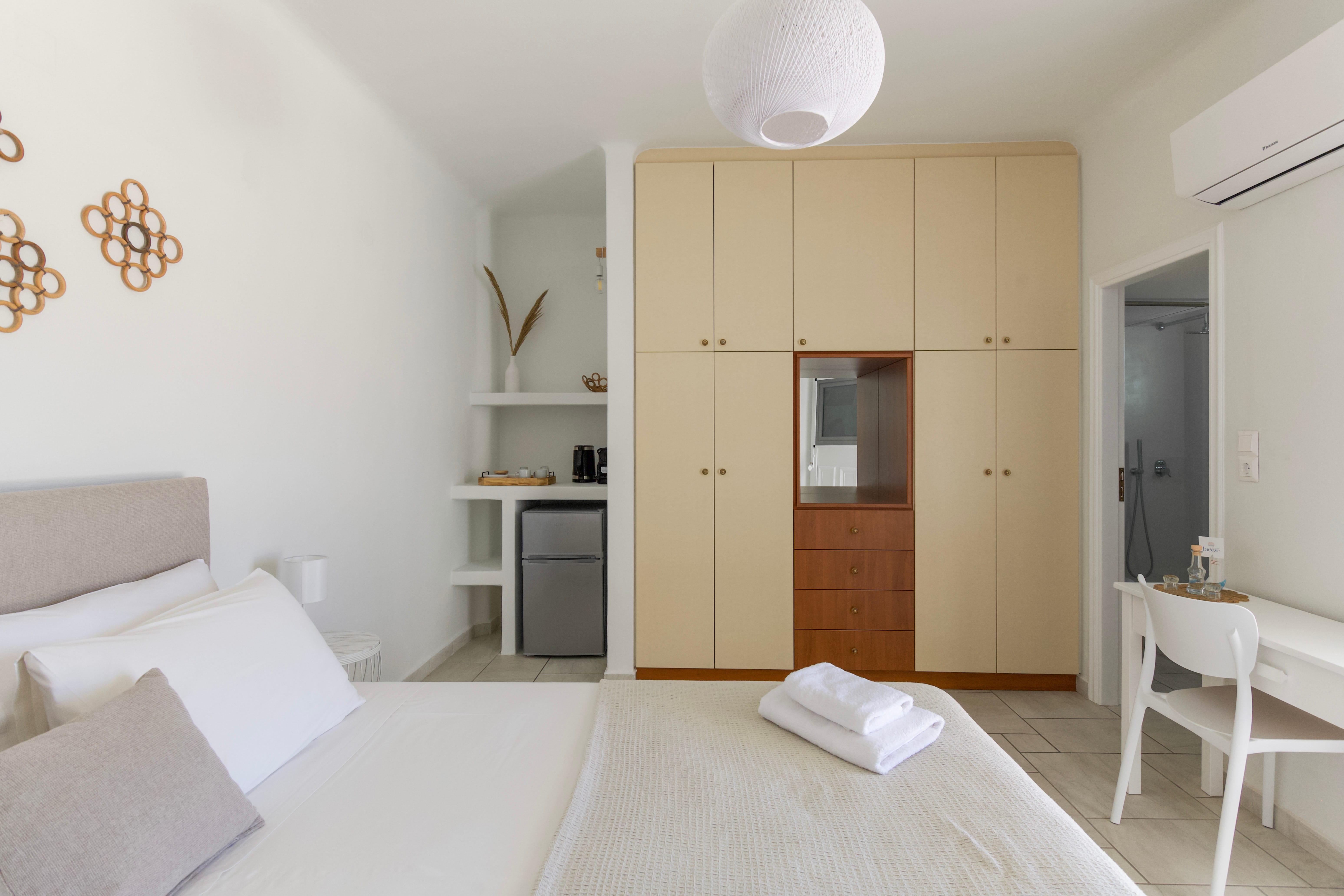 a room with a bed and a chair