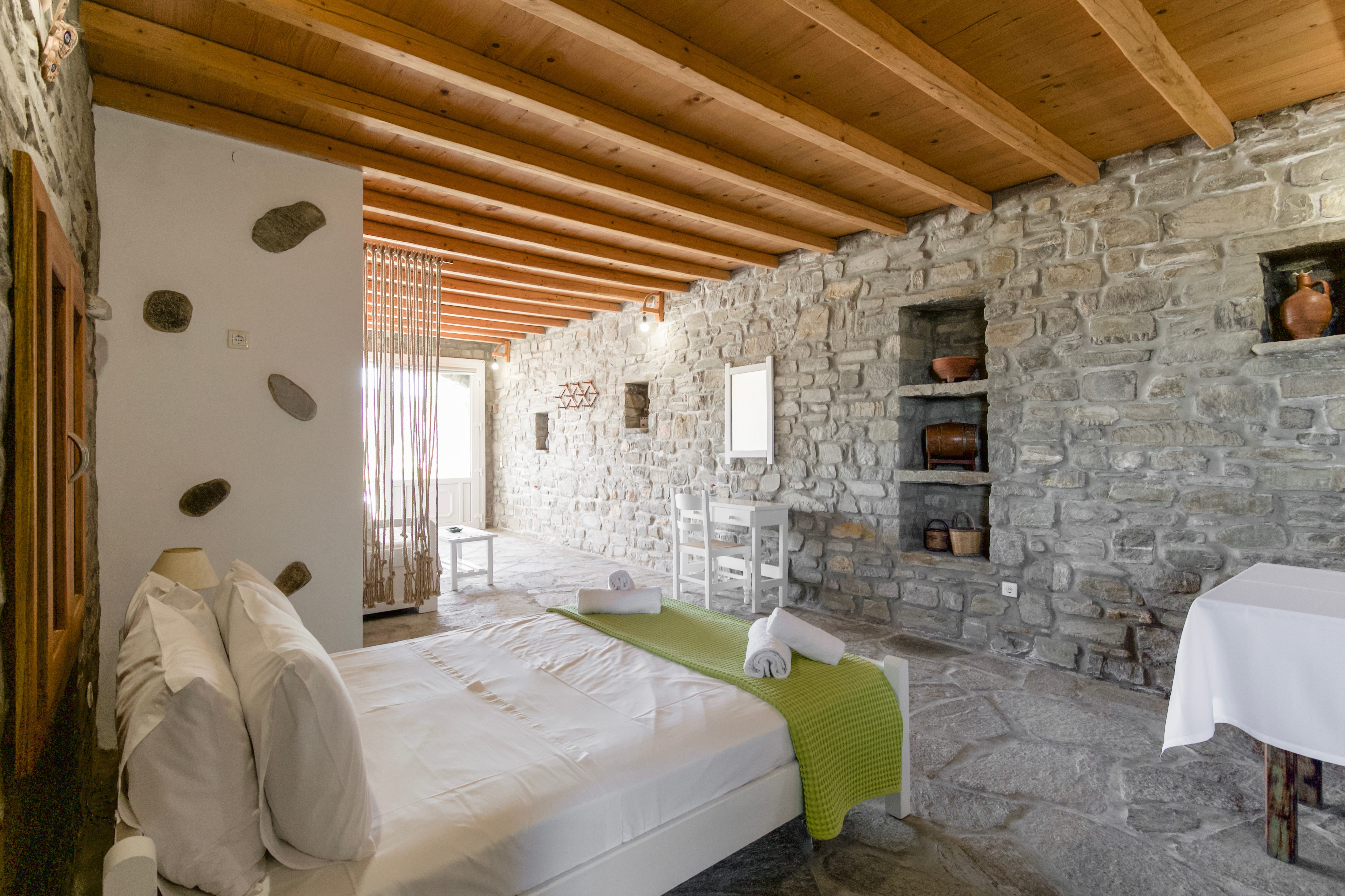 a room with a bed and a table