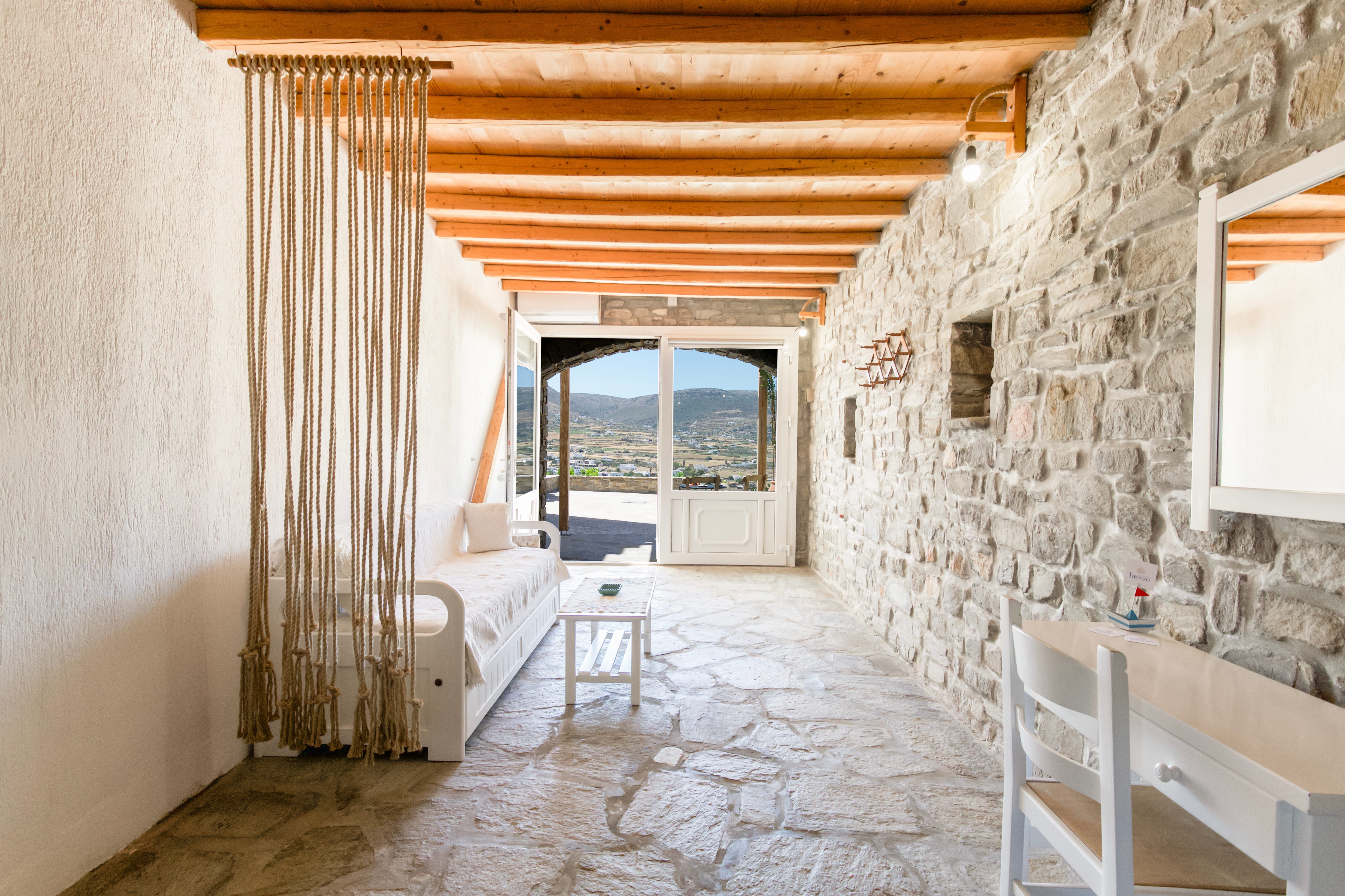a room with a bed and a window