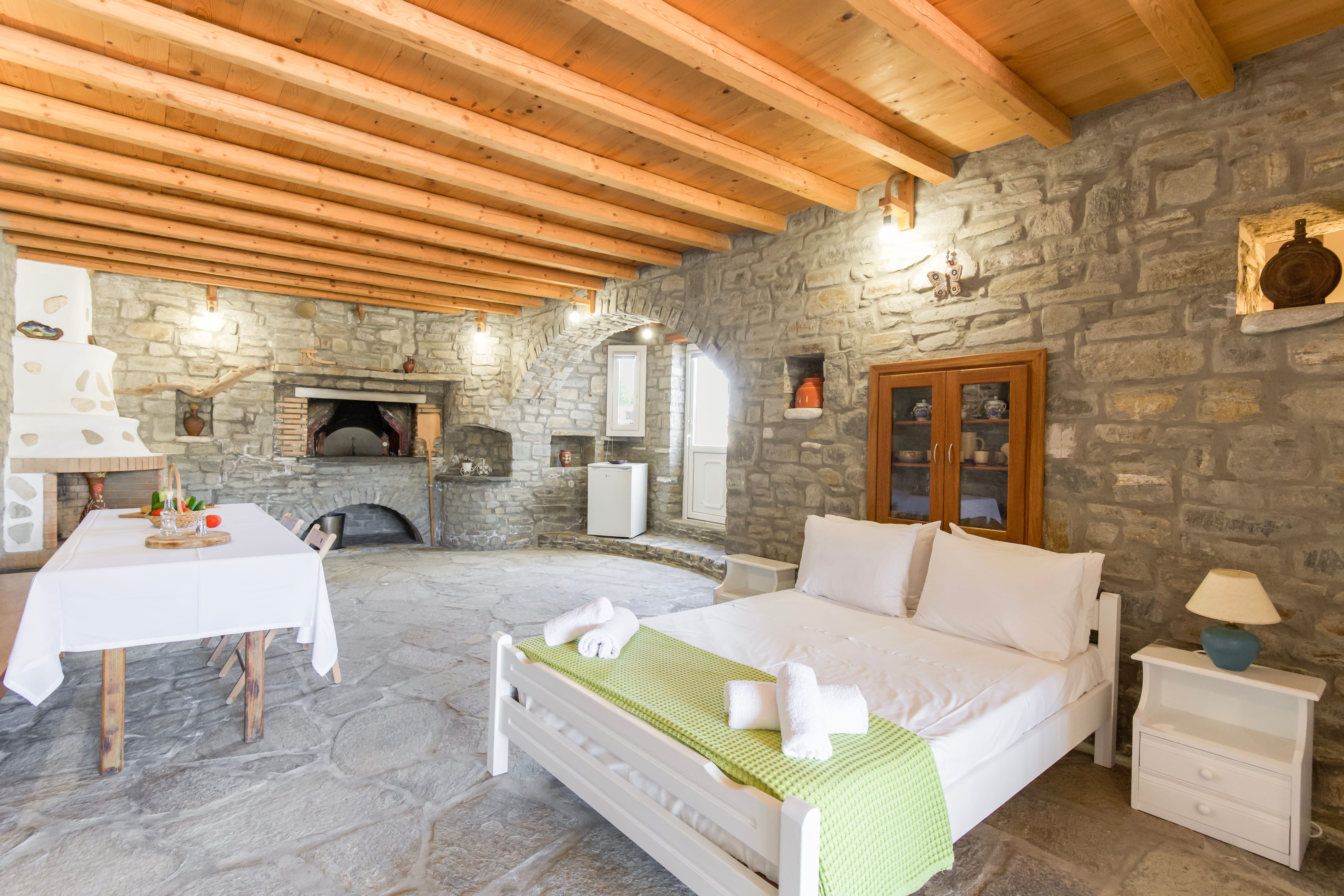 a room with a bed and a table