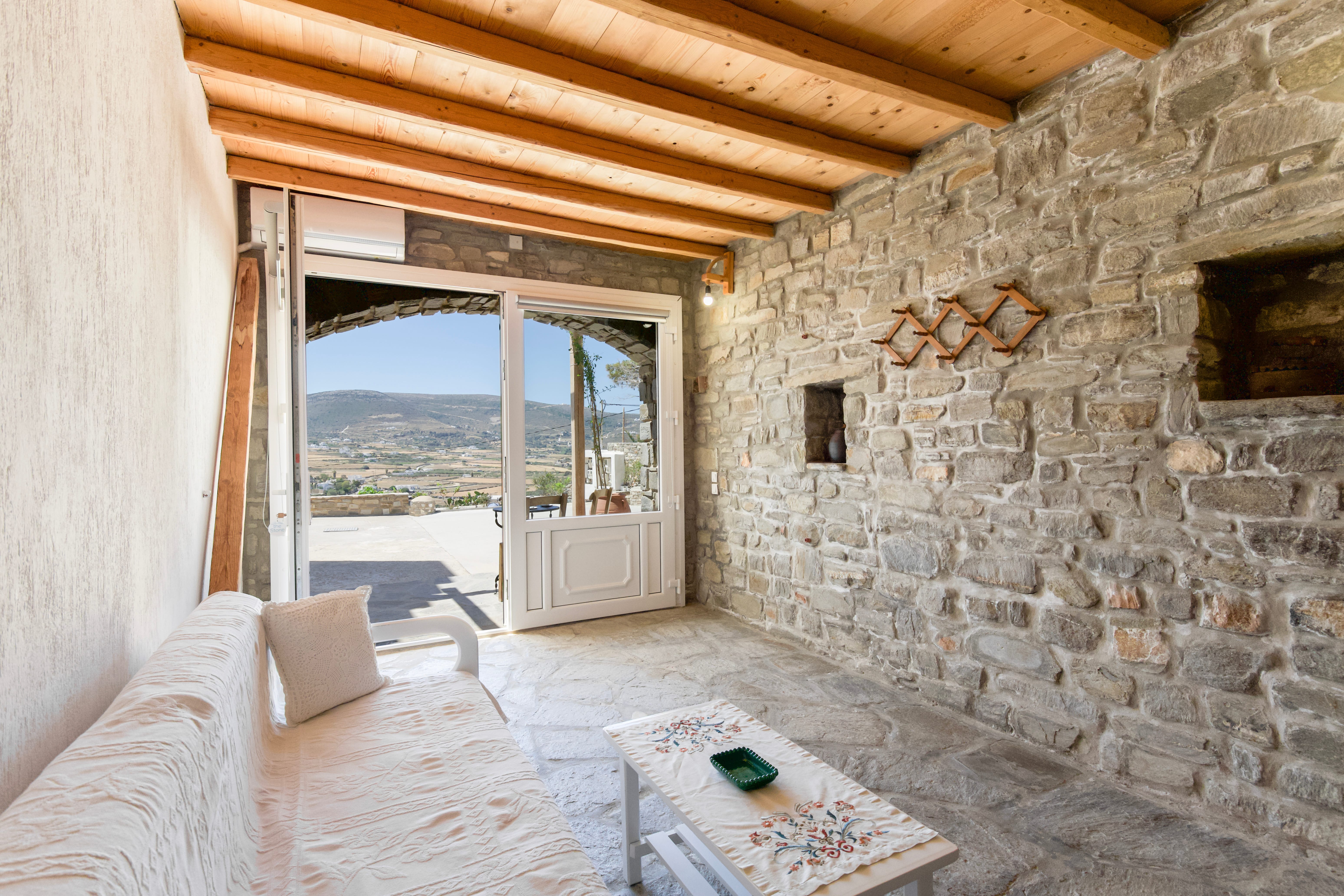 a living room with a view of the city
