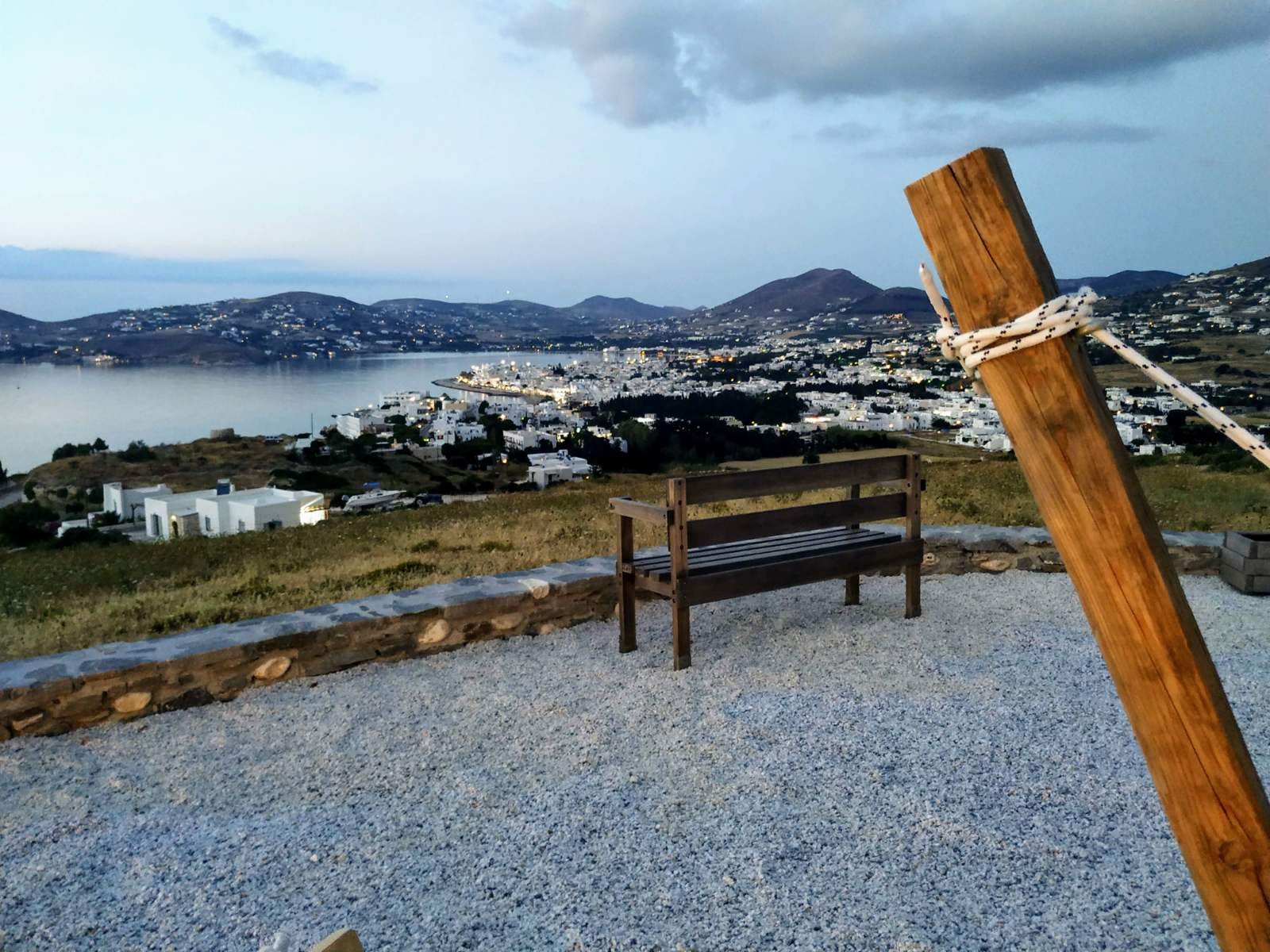 a bench overlooking a town
