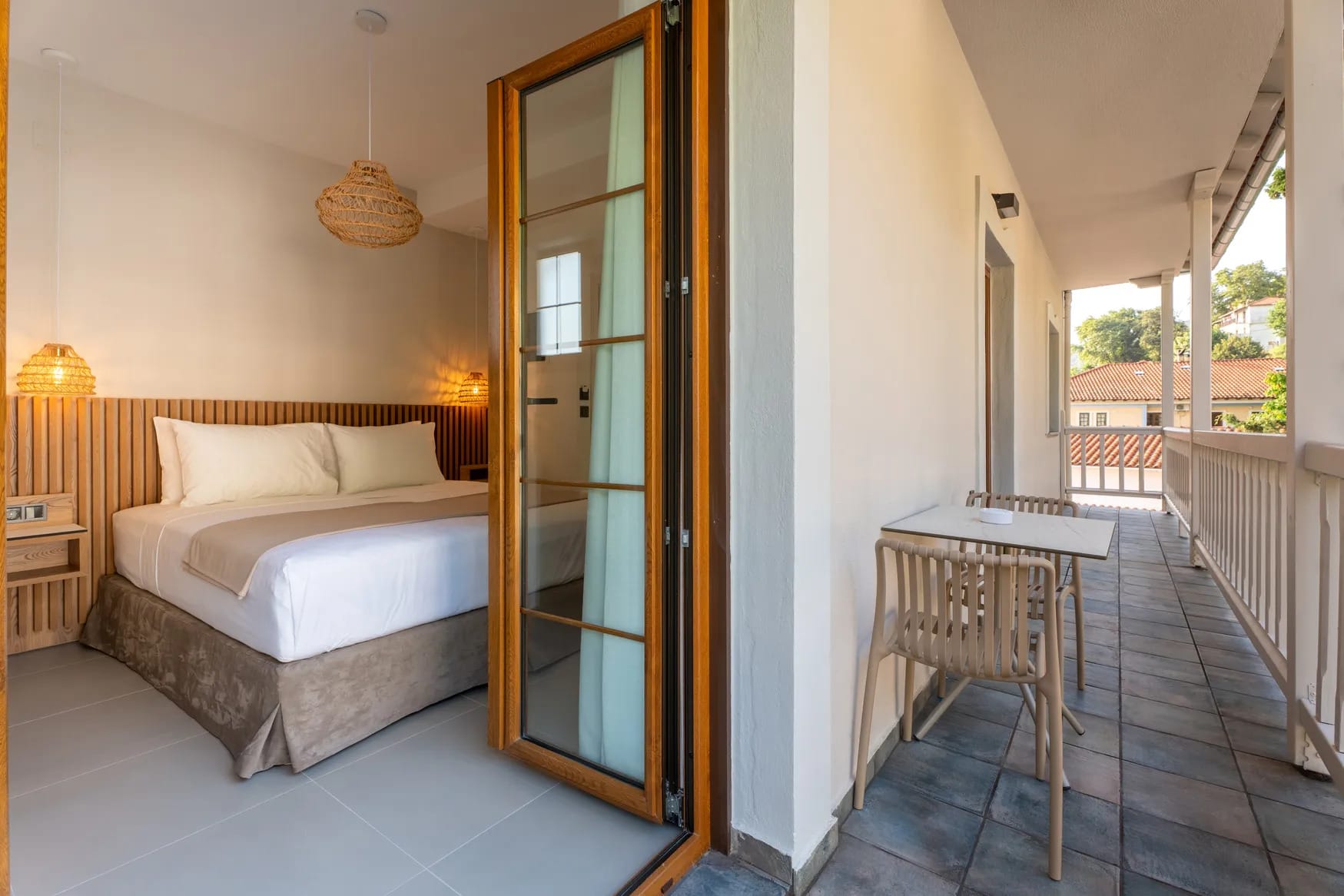 a bedroom with a bed and a table
