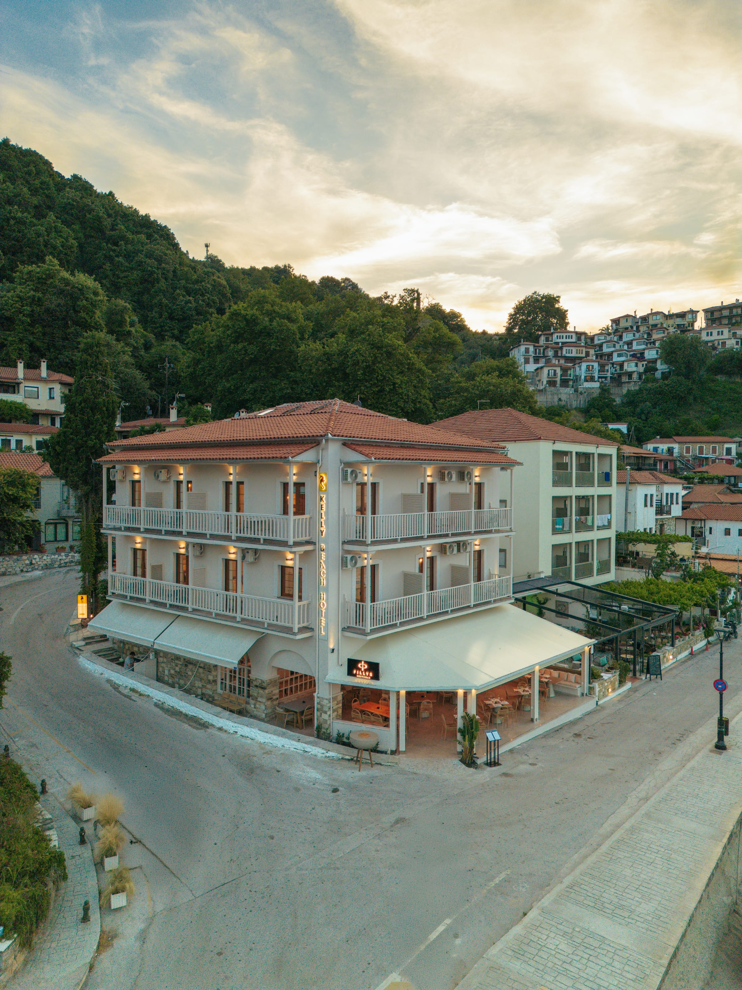 a building with a hill in the background