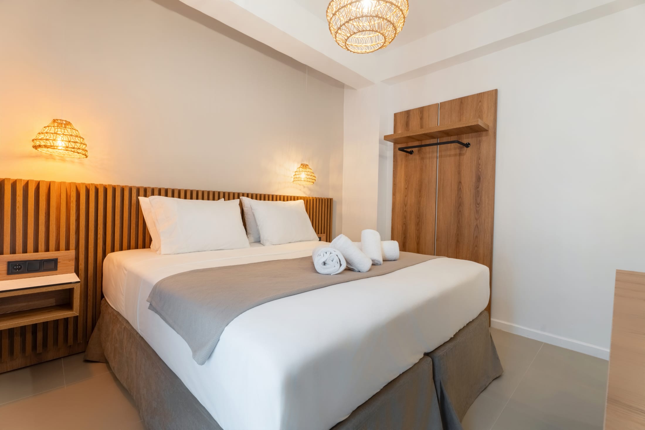 a bed with white sheets