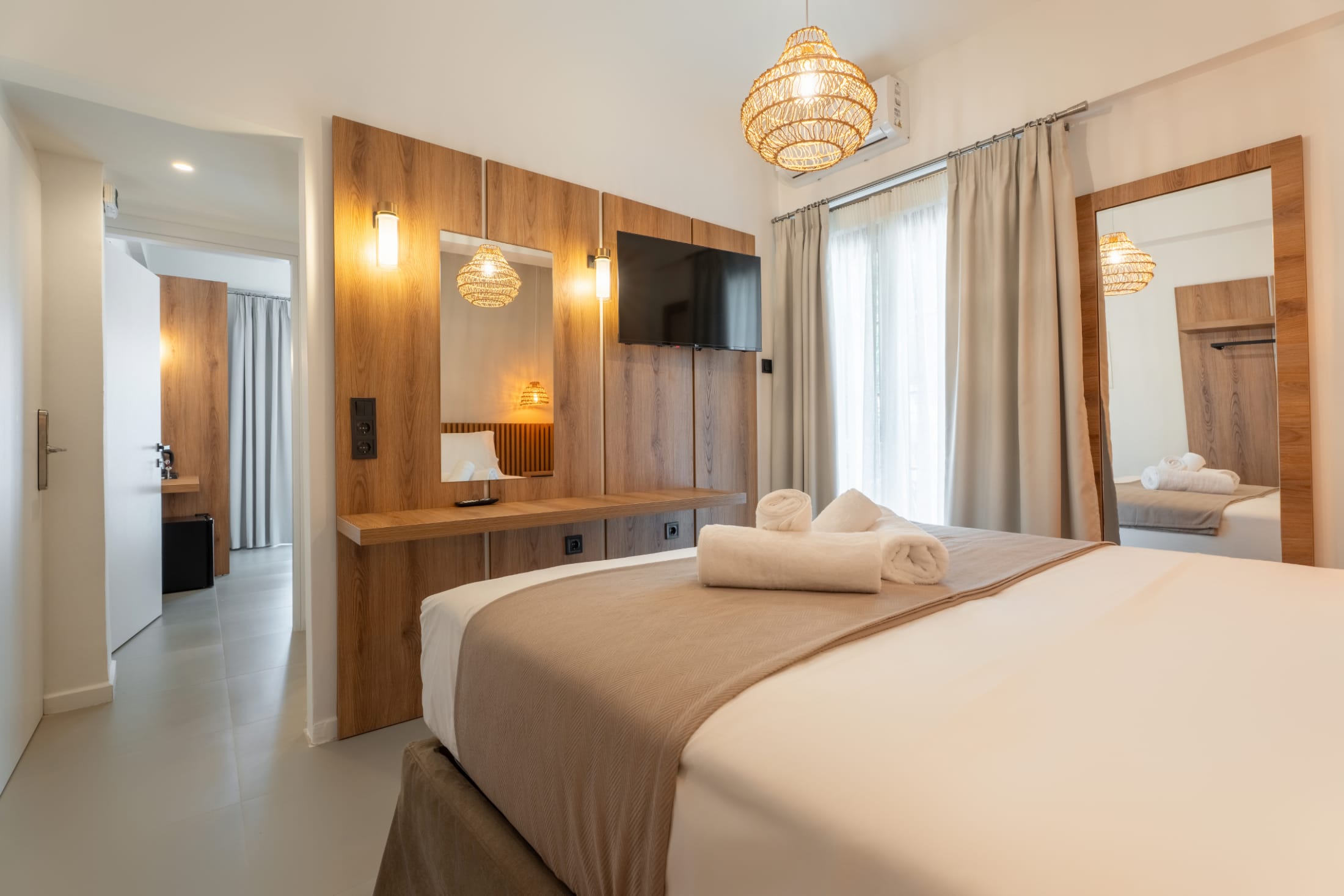 a large bedroom with a large bed