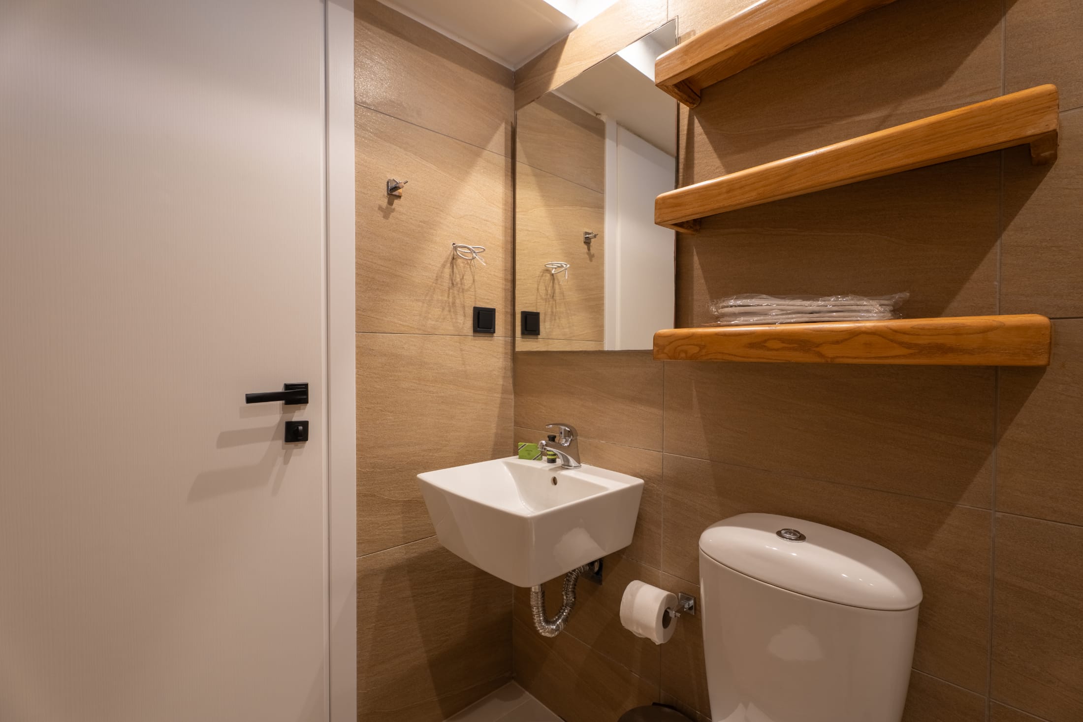 a bathroom with a sink and toilet