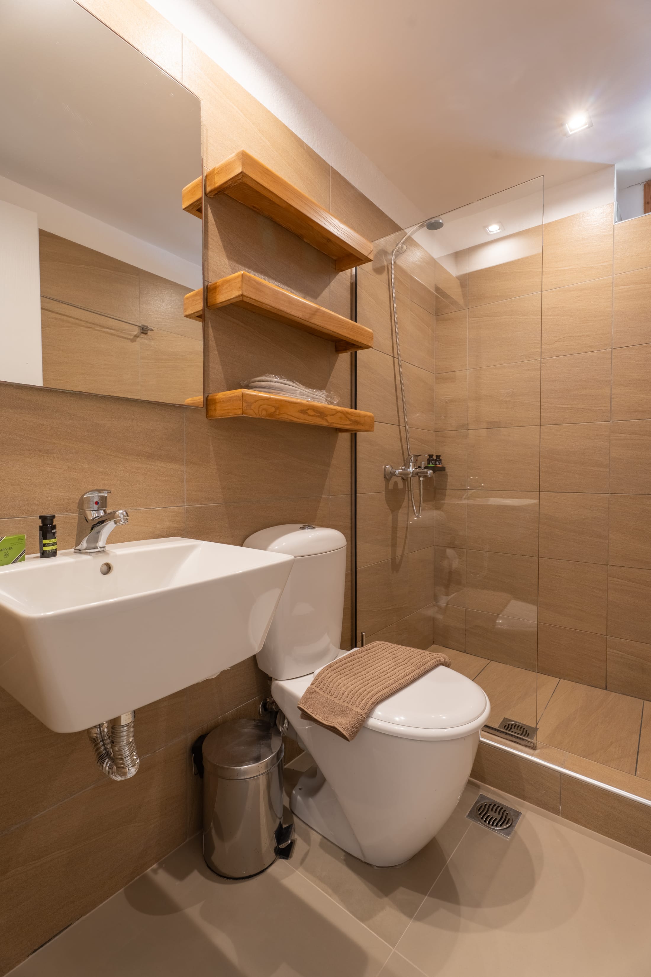 a bathroom with a stand up shower