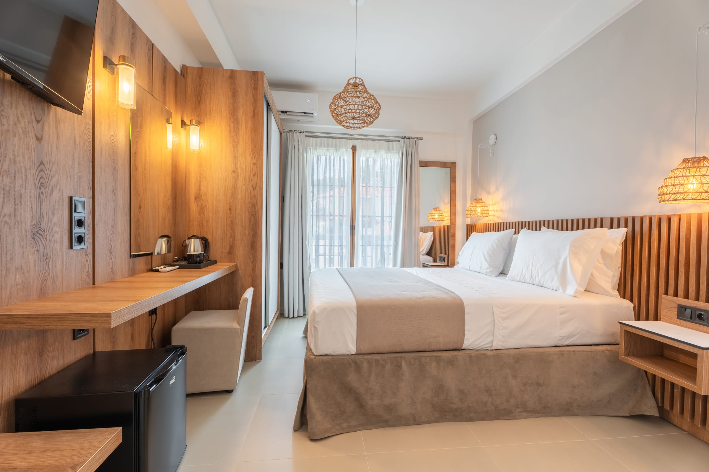 a bedroom with a bed and desk