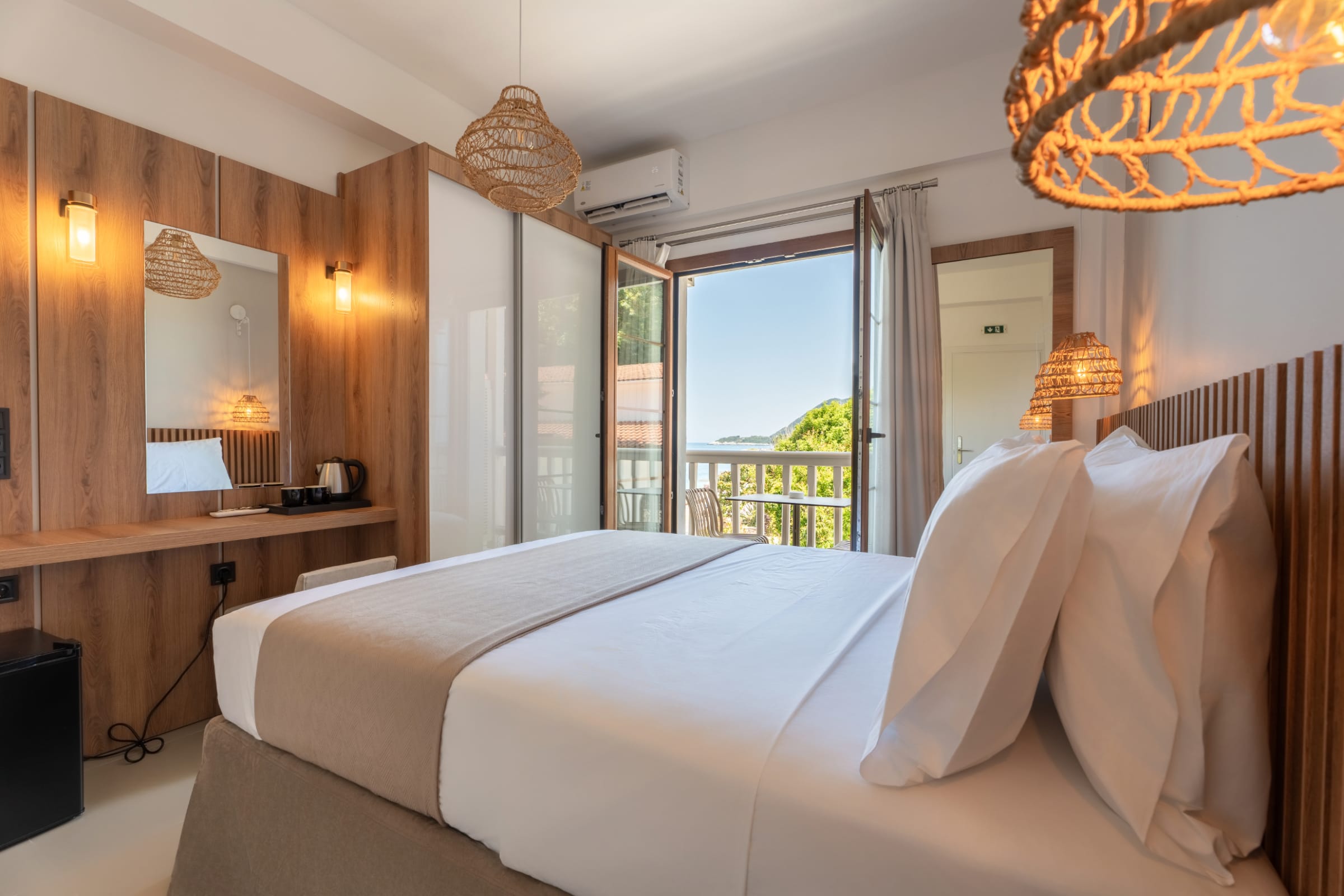 a bedroom with a large window