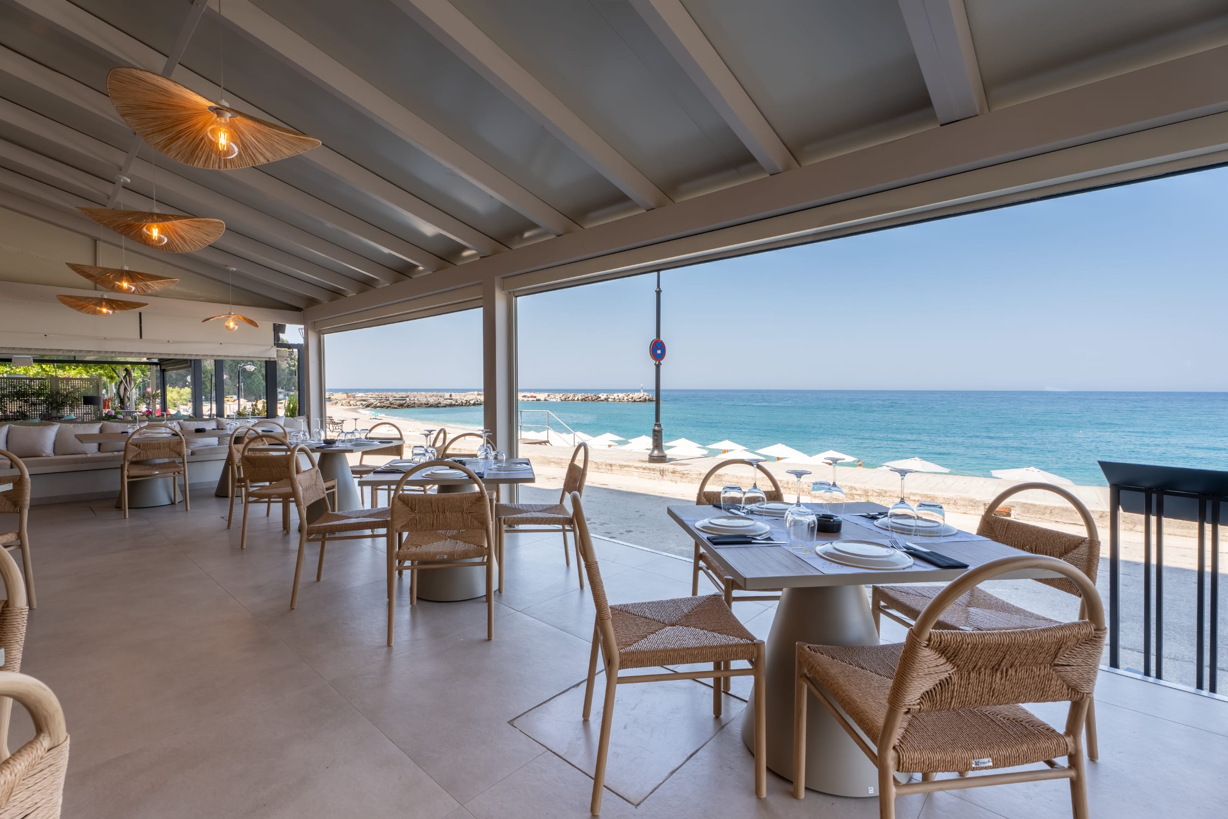 a restaurant with tables and chairs