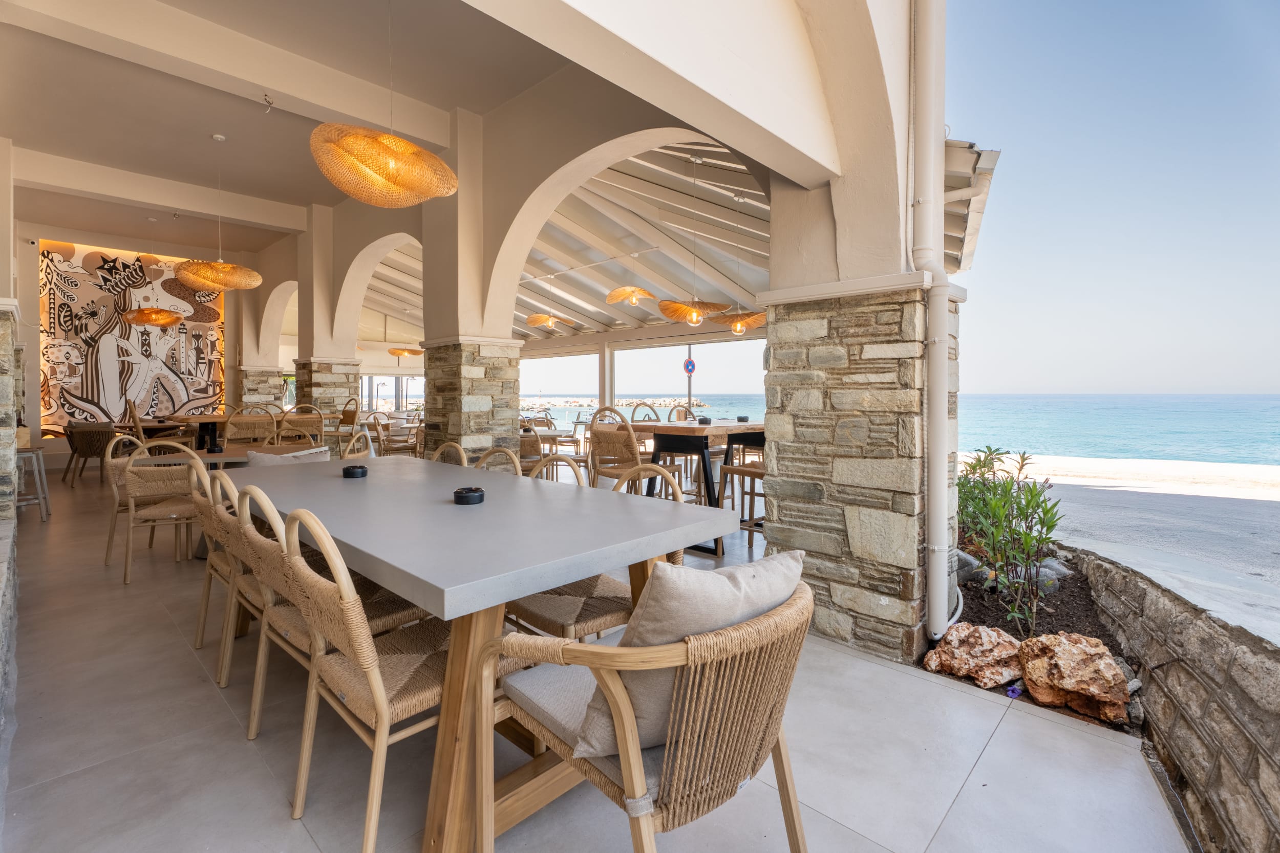 a table with chairs and a fireplace