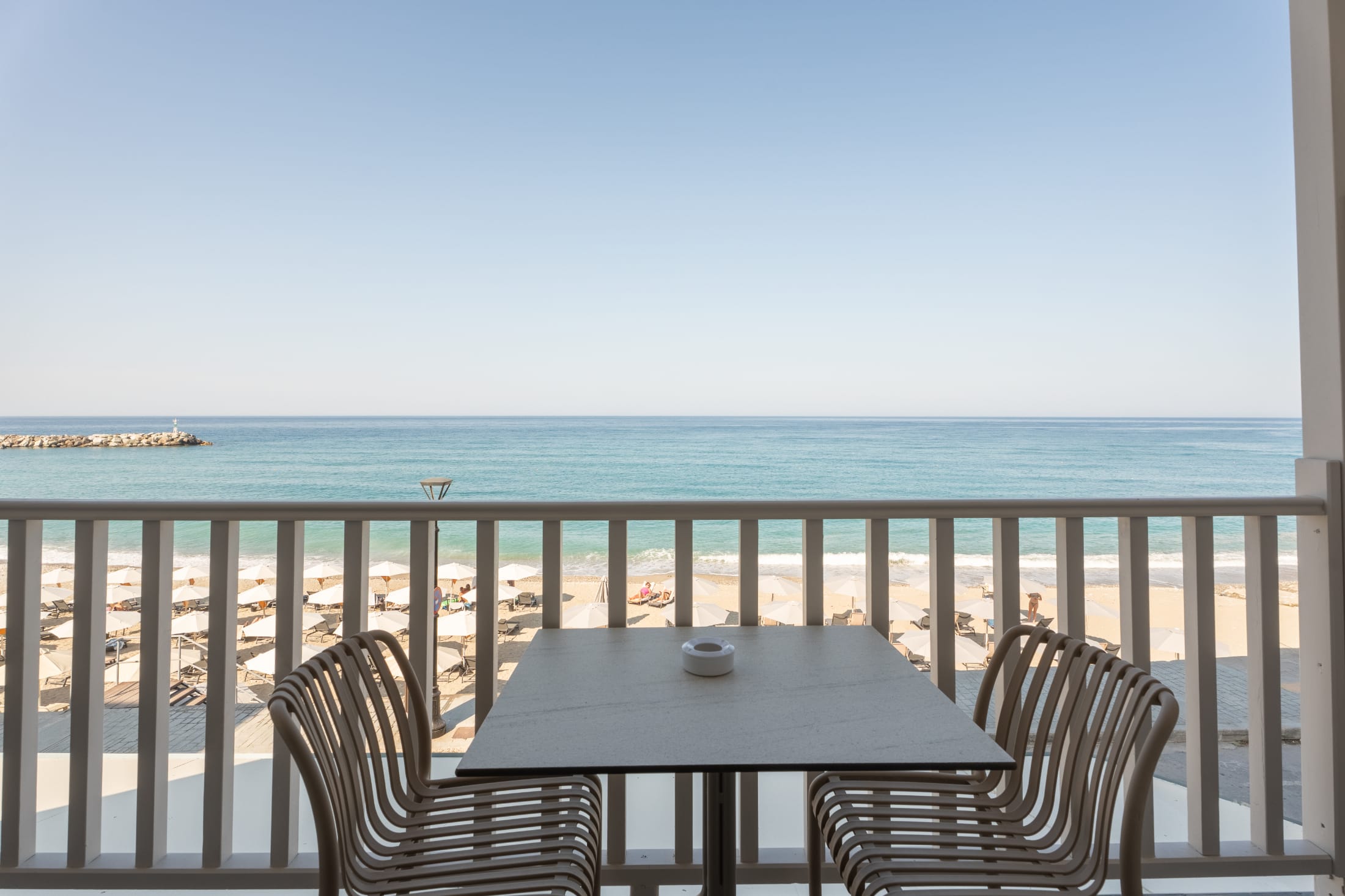 a table and chairs on a deck