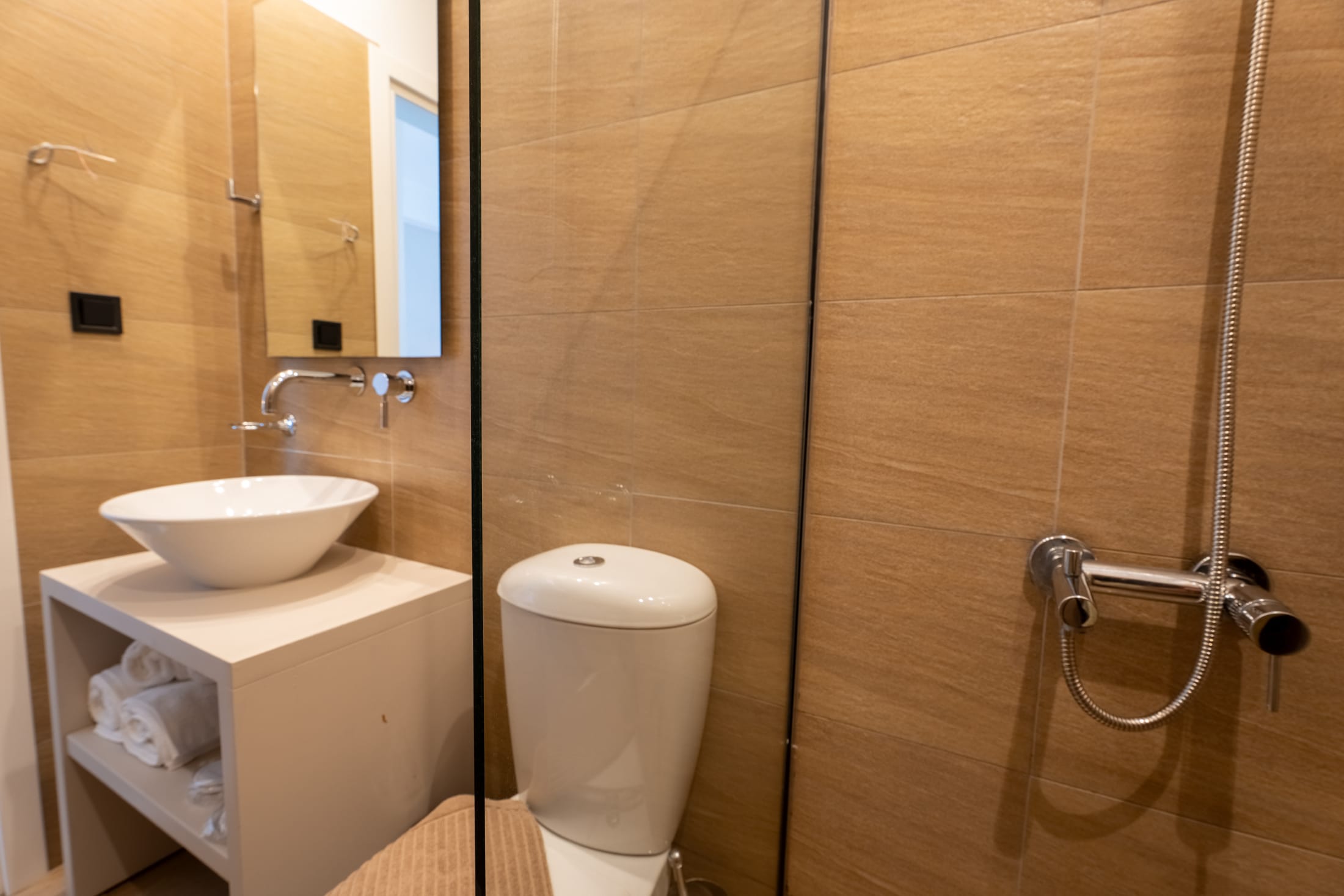 a bathroom with a toilet and sink