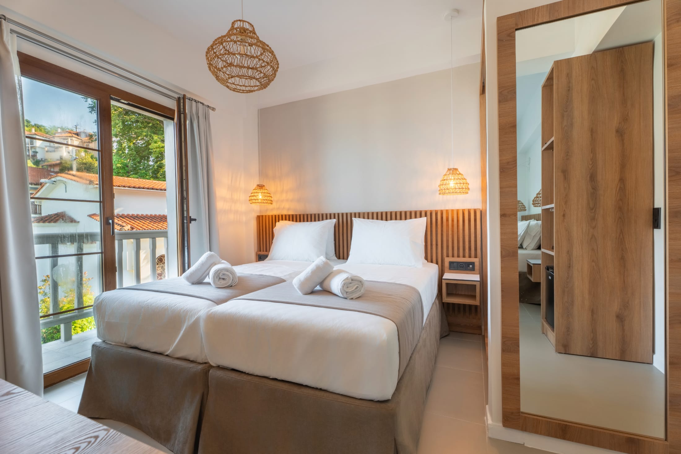 a bedroom with a large window