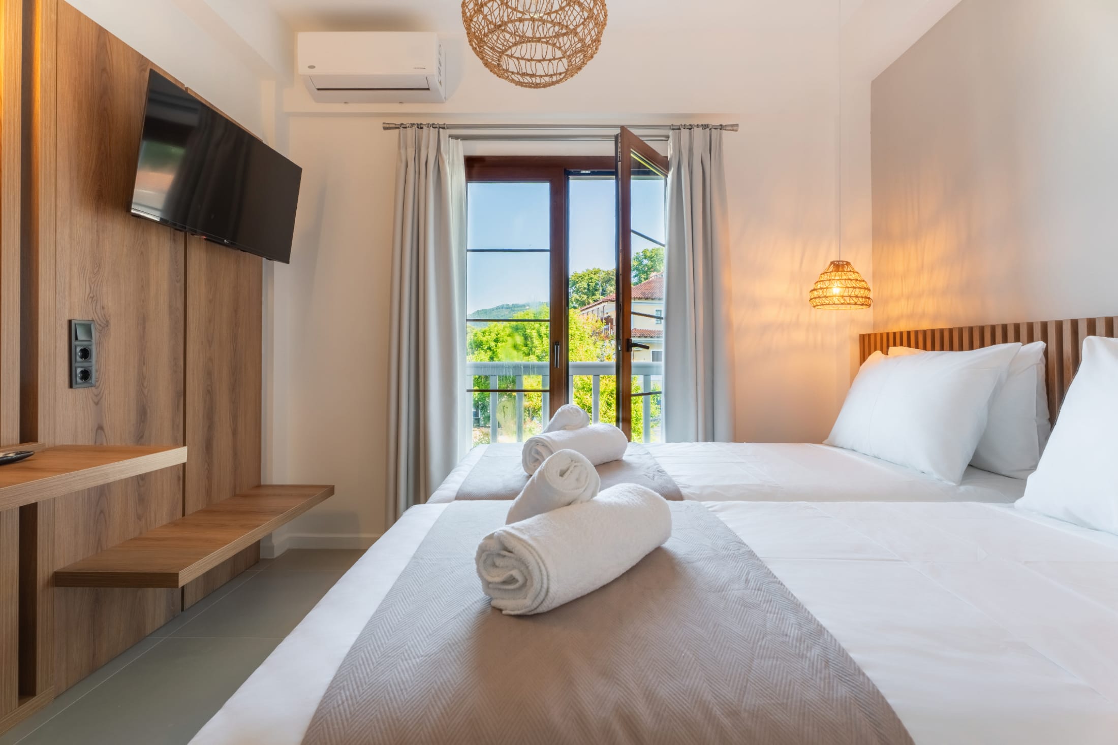 a hotel room with two beds
