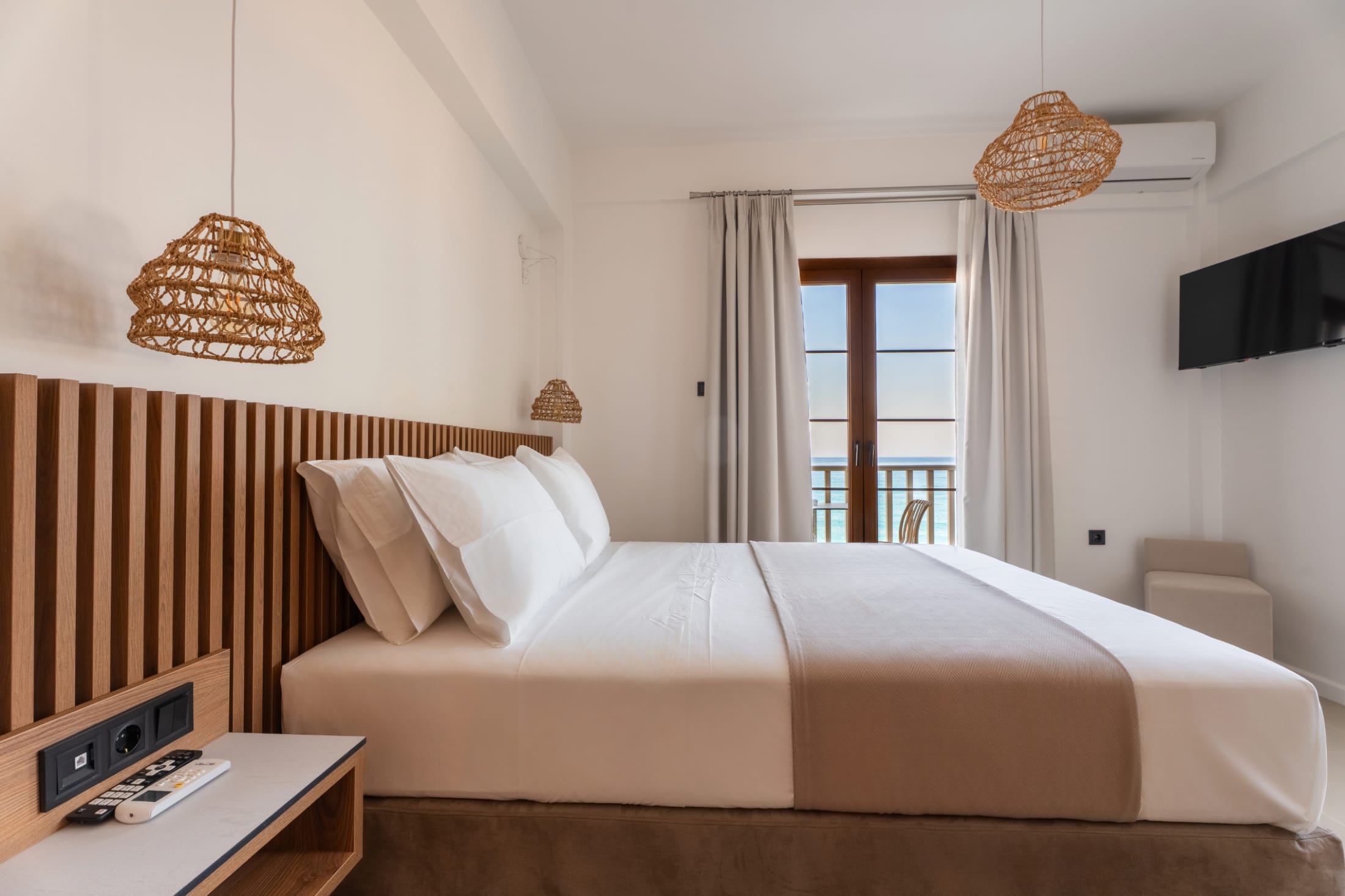 a bed with a white bed spread