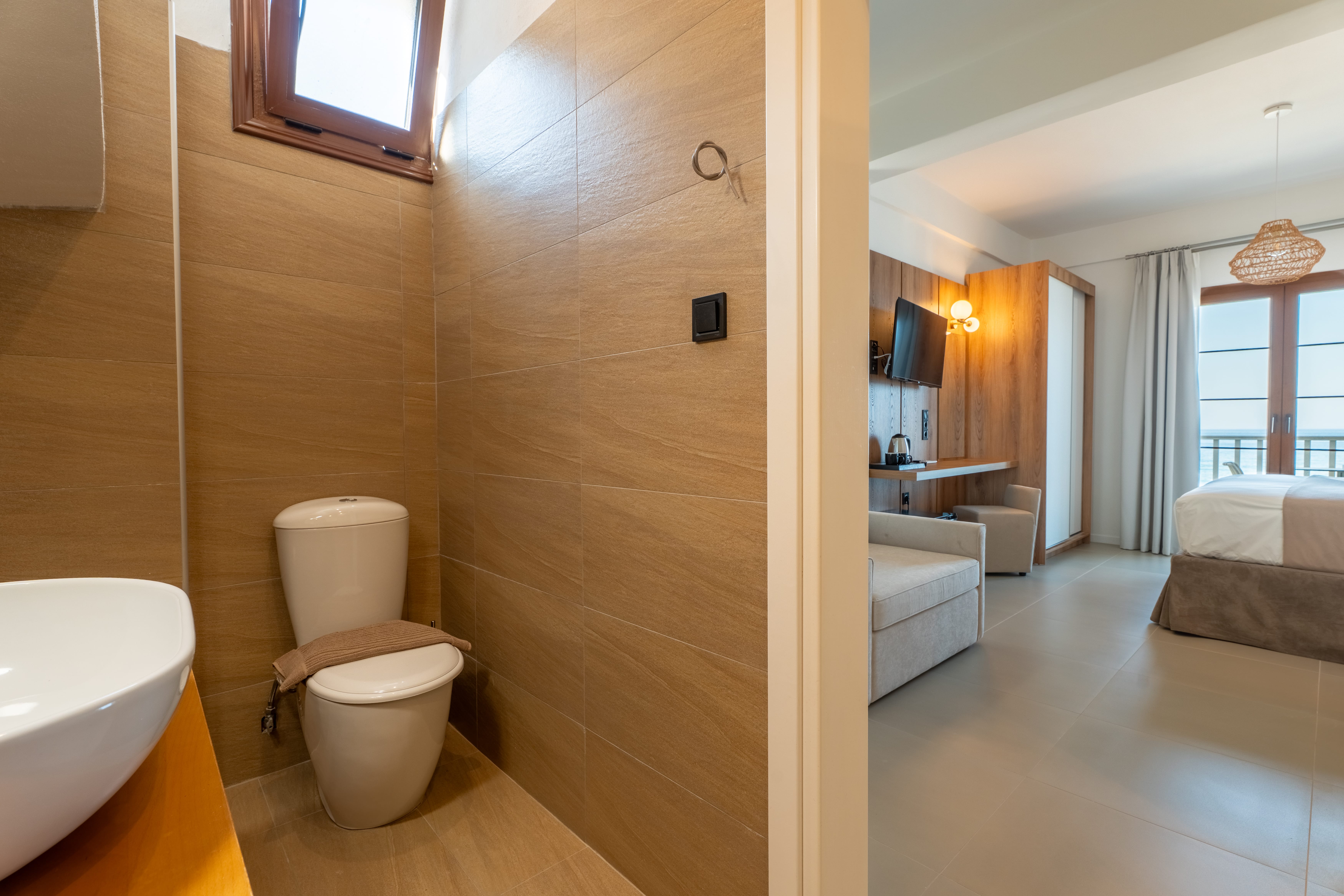 a bathroom with a toilet and sink