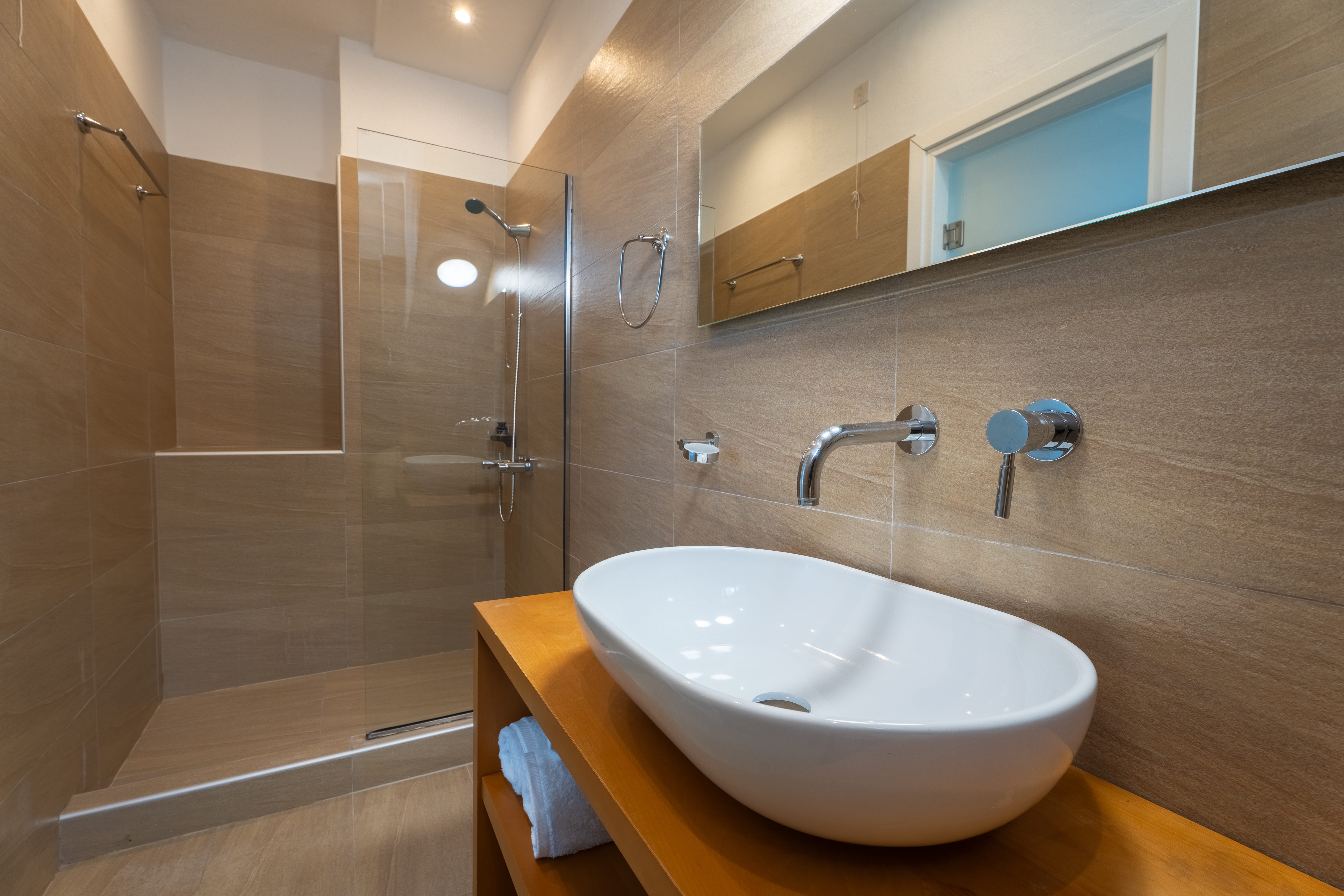 a bathroom with a sink and shower