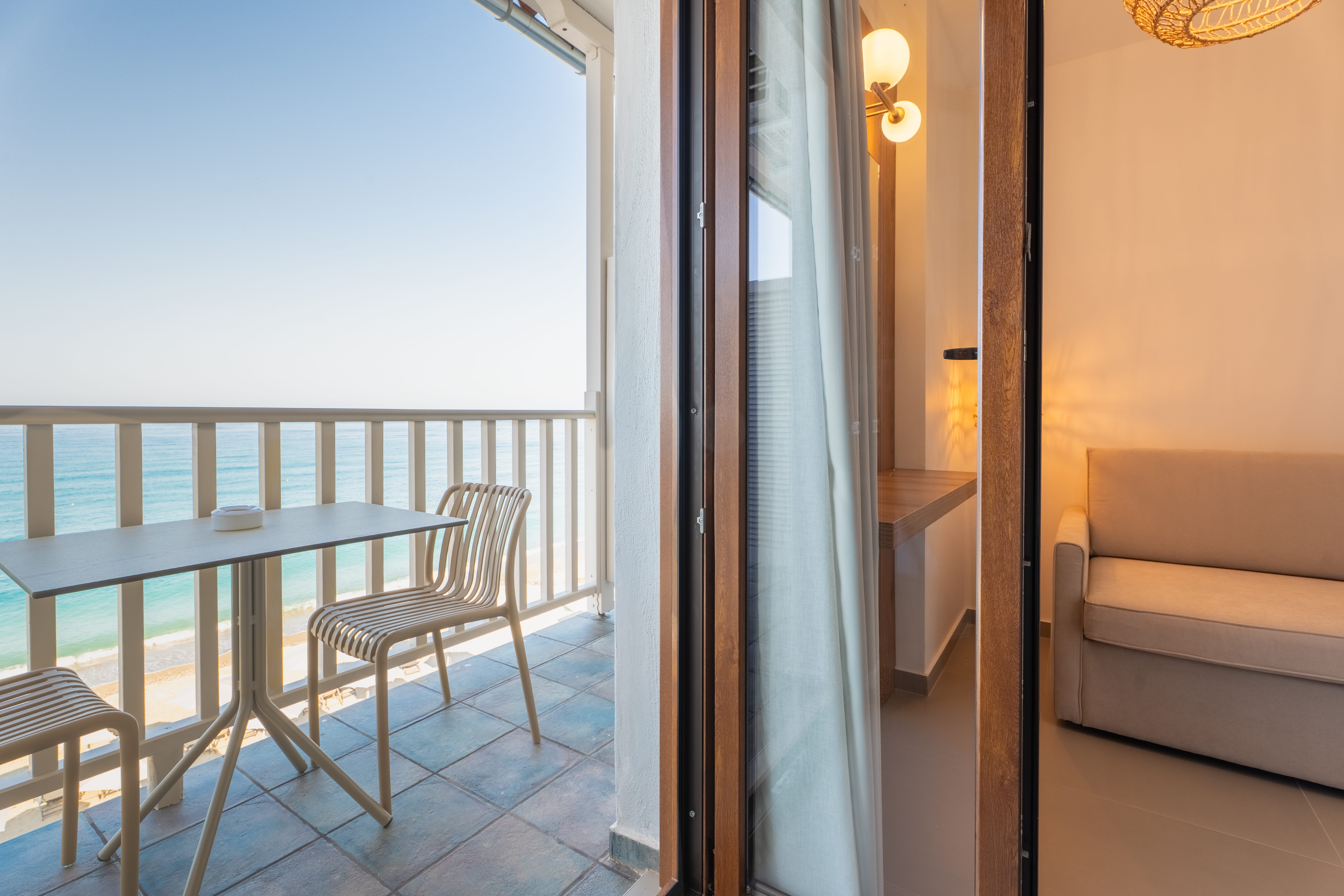 a room with a table and chairs